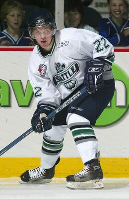 VANCOUVER - OCTOBER 2: Greg Scott #22 of the Seattle Thunderbirds skates against the Vancouver Giants during the WHL hockey game on October 2, 2005 at Pacific Coliseum in Vancouver, British Columbia, Canada.  (Photo By Chris Relke/Getty Images)