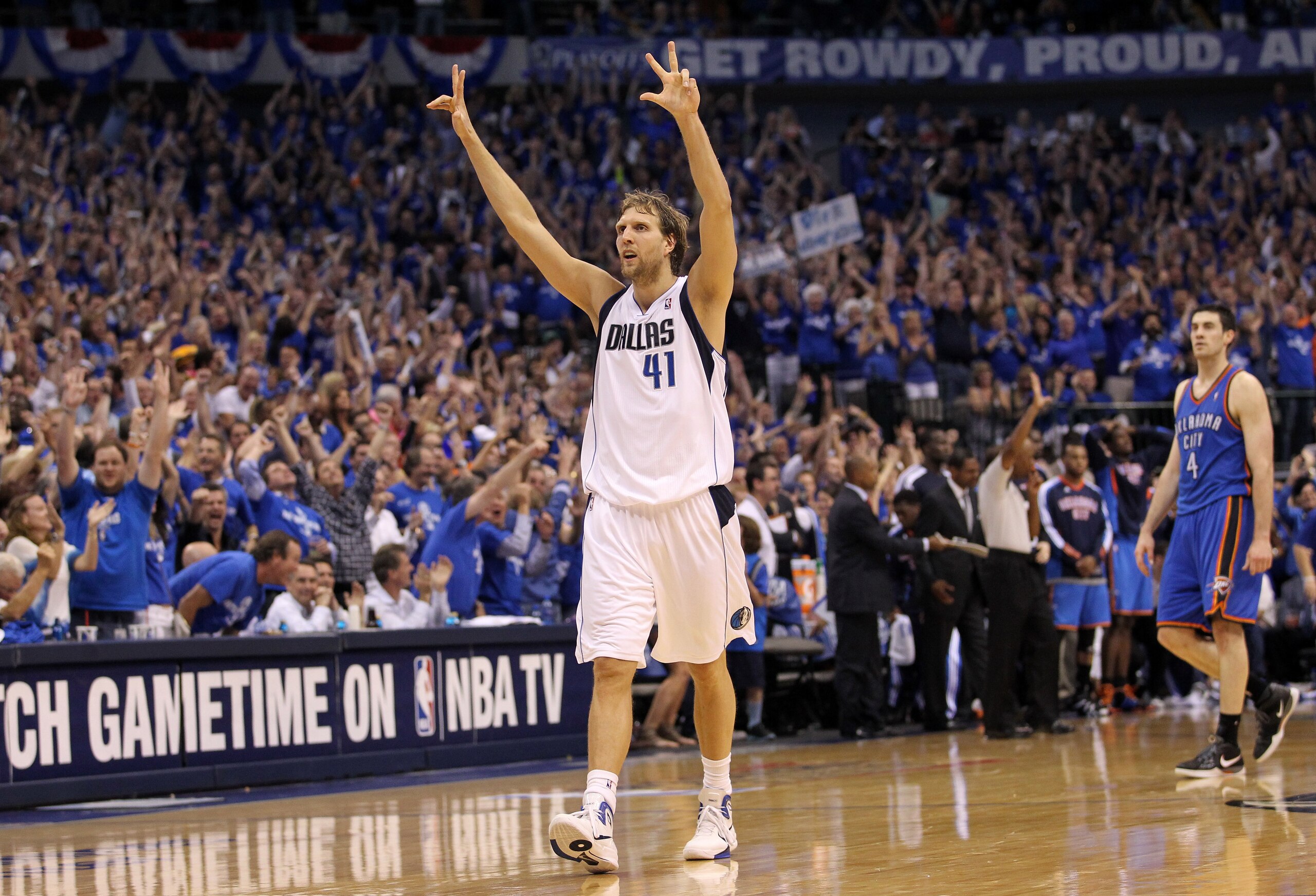 DALLAS, TX - MAY 25:  Dirk Nowitzki #41 of the Dallas Mavericks reacts after making a three-pointer in the fourth quarter while taking on the Oklahoma City Thunder in Game Five of the Western Conference Finals during the 2011 NBA Playoffs at American Airl