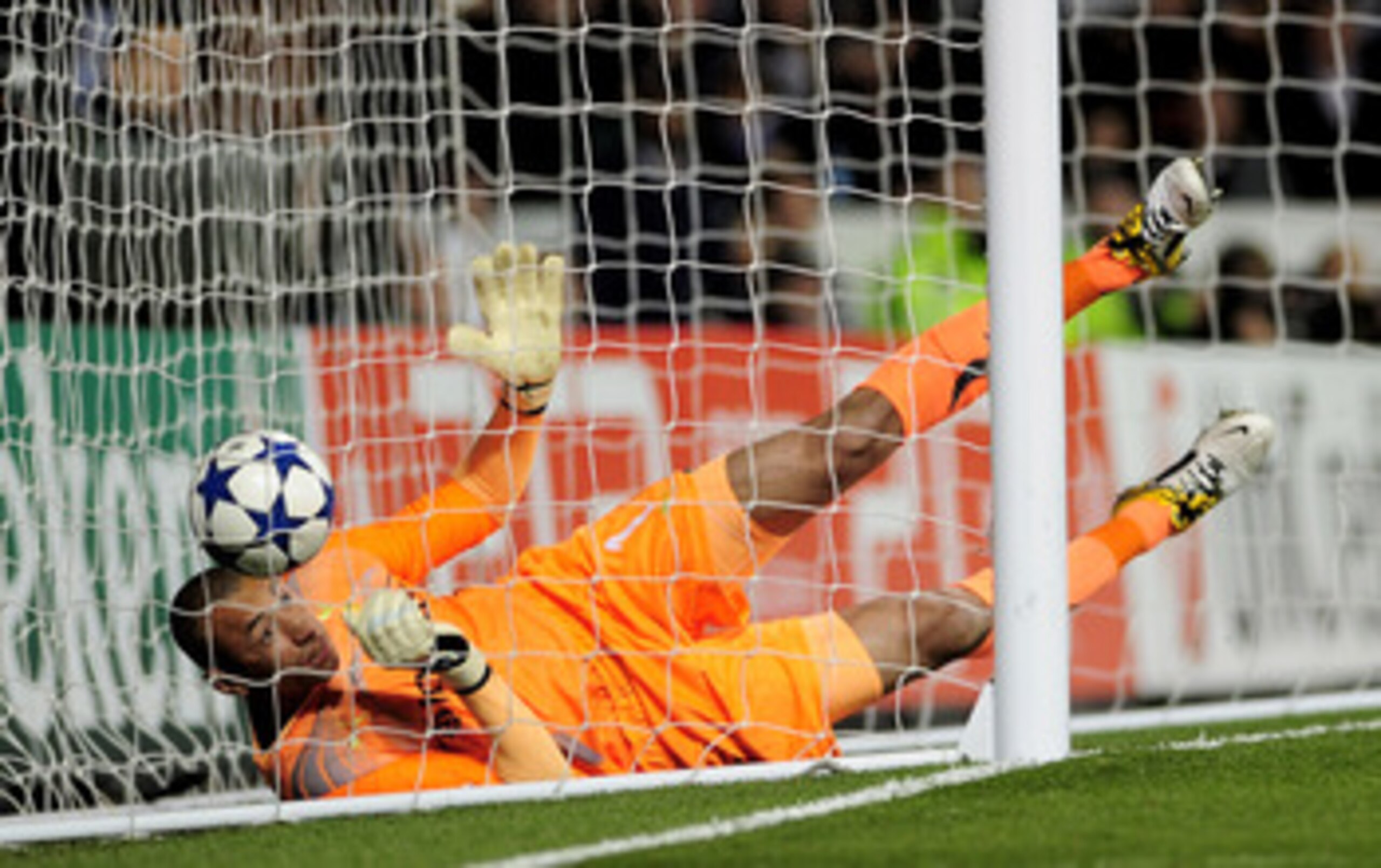 LONDON, ENGLAND - APRIL 13: Goalkeeper Heurelho Gomes of Spurs can't stop Cristiano Ronaldo of Real Madrid scoring their first goal during the UEFA Champions League quarter final second leg match between Tottenham Hotspur and Real Madrid at White Hart La LONDON, ENGLAND - APRIL 13: Goalkeeper Heurelho Gomes of Spurs can't stop Cristiano Ronaldo of Real Madrid scoring their first goal during the UEFA Champions League quarter final second leg match between Tottenham Hotspur and Real Madrid at White Hart La