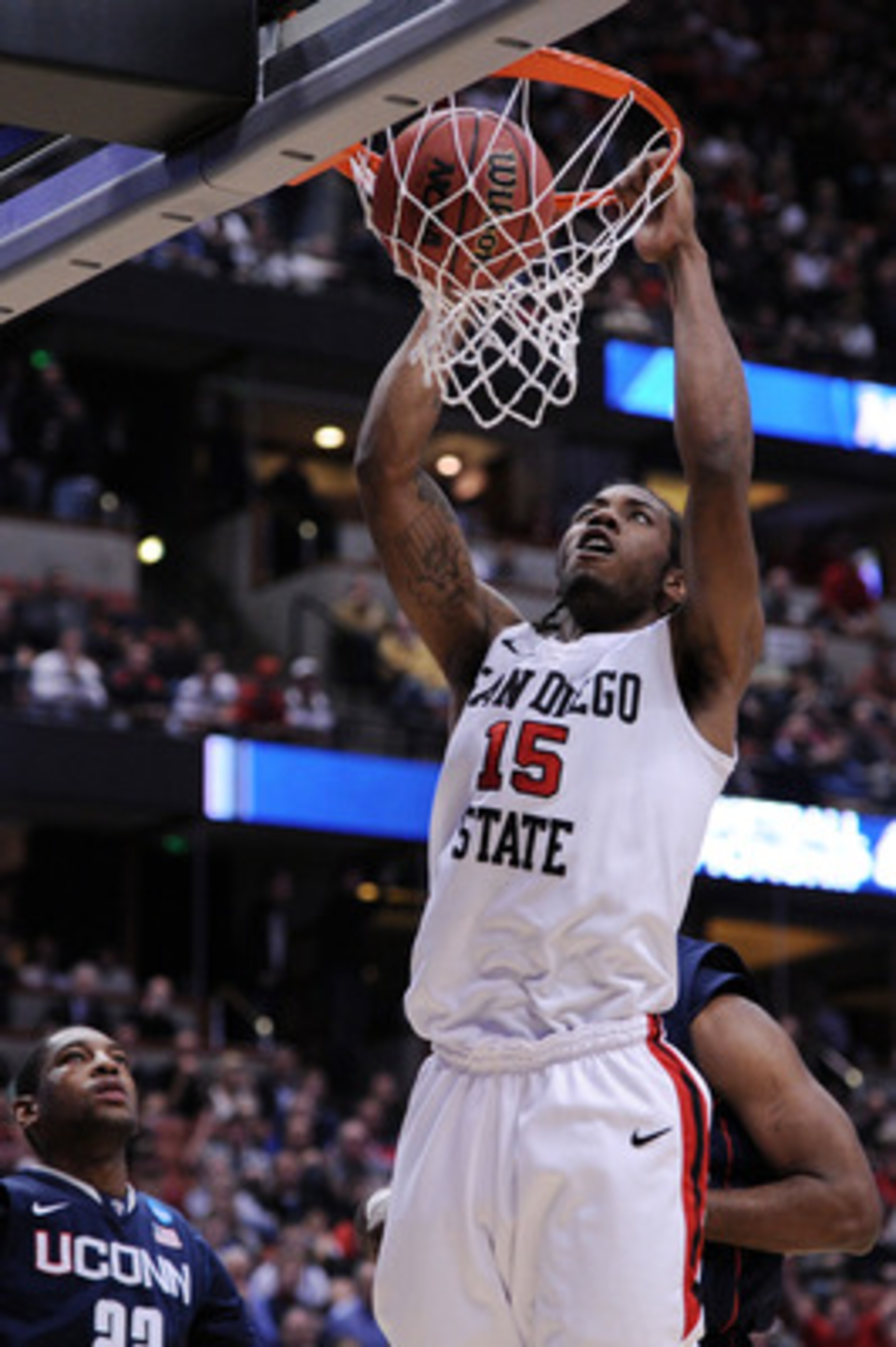 ANAHEIM, CA - MARCH 24: Kawhi Leonard #15 of the San Diego State Aztecs dunks the ball against the Connecticut Huskies during the west regional semifinal of the 2011 NCAA men's basketball tournament at the Honda Center on March 24, 2011 in Anaheim, Calif ANAHEIM, CA - MARCH 24: Kawhi Leonard #15 of the San Diego State Aztecs dunks the ball against the Connecticut Huskies during the west regional semifinal of the 2011 NCAA men's basketball tournament at the Honda Center on March 24, 2011 in Anaheim, Calif