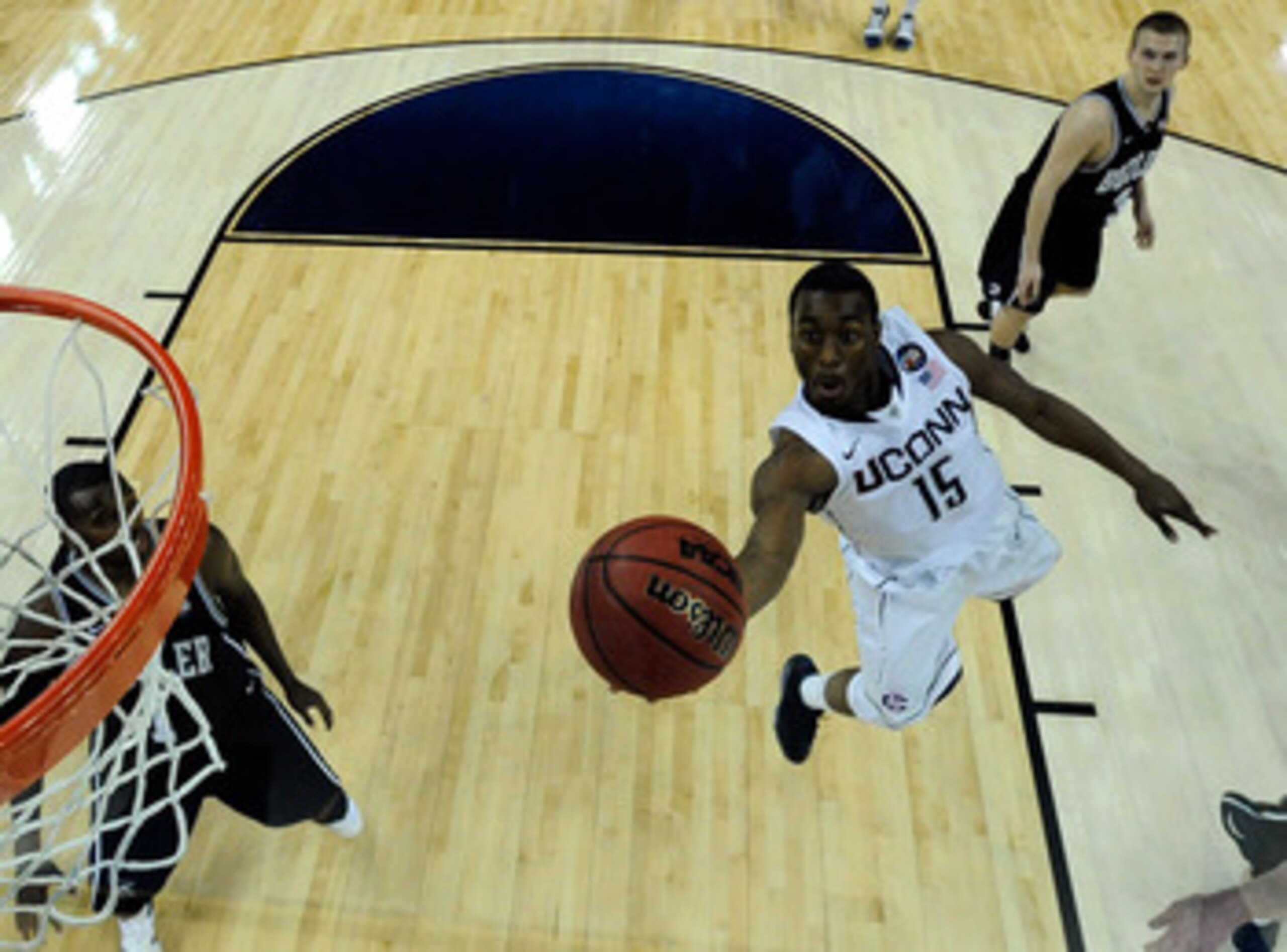 HOUSTON, TX - APRIL 04:  Kemba Walker #15 of the Connecticut Huskies goes to the basket against the Butler Bulldogs during the National Championship Game of the 2011 NCAA Division I Men's Basketball Tournament at Reliant Stadium on April 4, 2011 in Housto