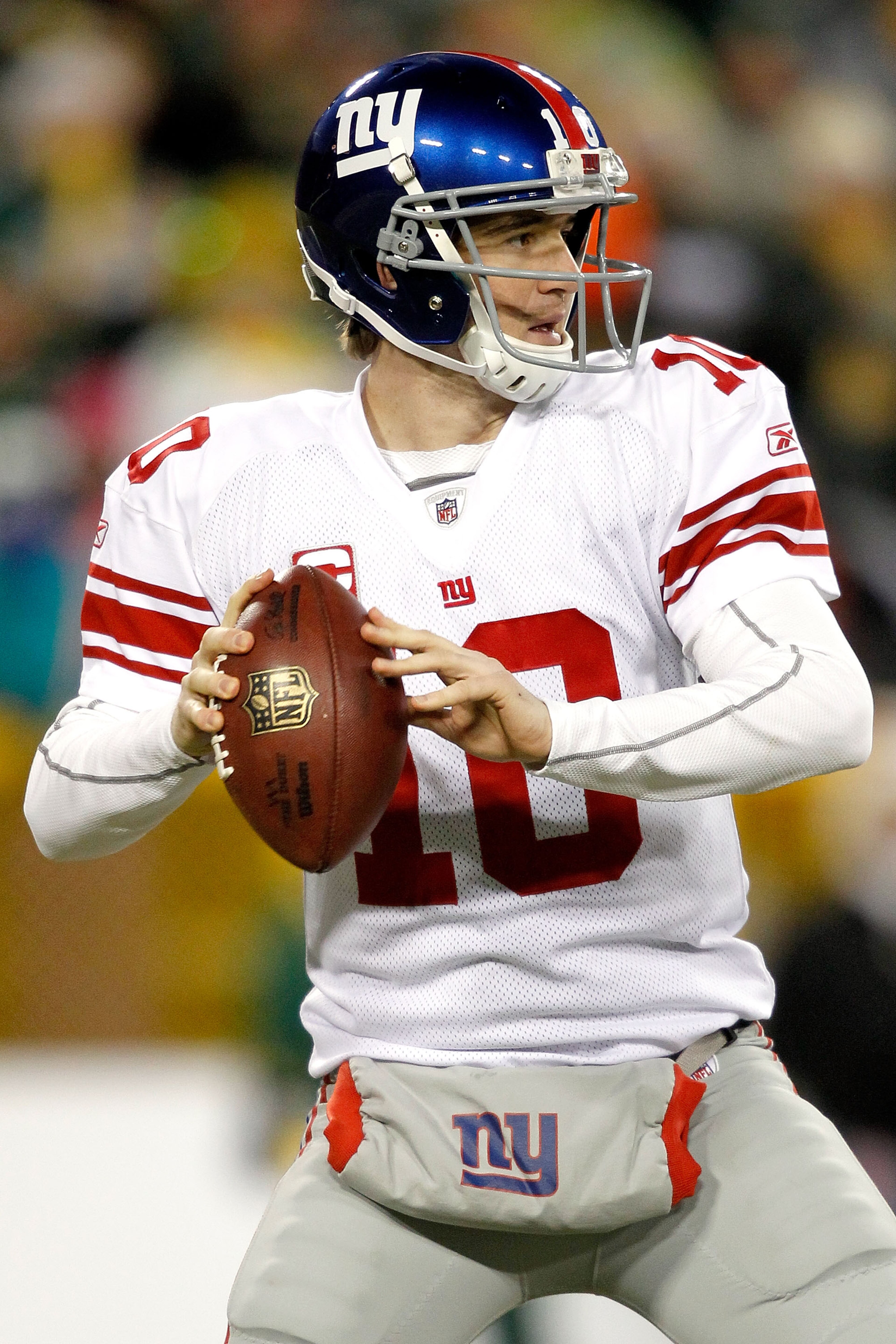 GREEN BAY, WI - DECEMBER 26: Eli Manning #10 of the New York Giants throws against the Green Bay Packers at Lambeau Field on December 26, 2010 in Green Bay, Wisconsin. (Photo by Matthew Stockman/Getty Images) GREEN BAY, WI - DECEMBER 26: Eli Manning #10 of the New York Giants throws against the Green Bay Packers at Lambeau Field on December 26, 2010 in Green Bay, Wisconsin. (Photo by Matthew Stockman/Getty Images)