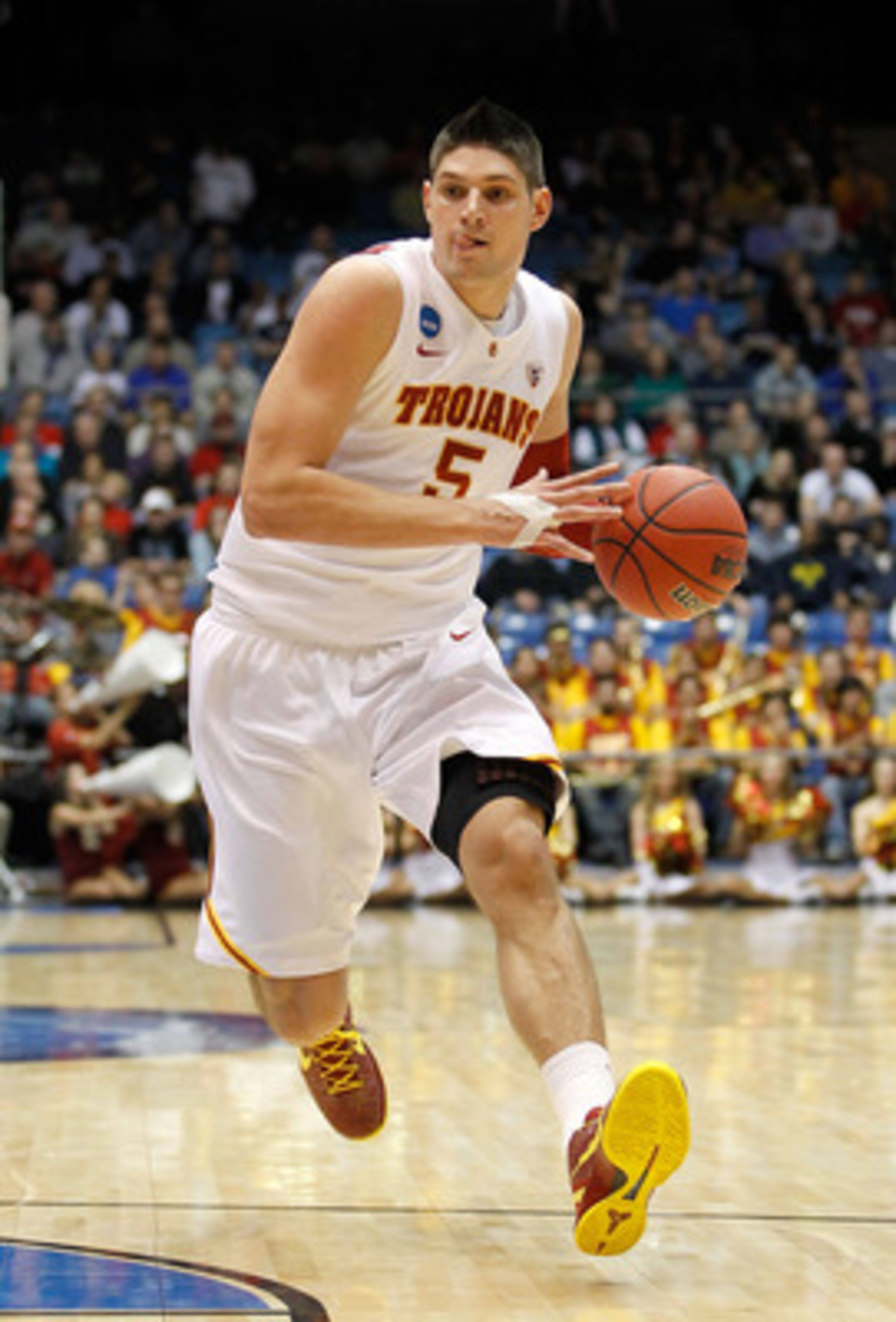 DAYTON, OH - MARCH 16: Nikola Vucevic #5 of the USC Trojans handles the ball against the Virginia Commonwealth Rams during the first round of the 2011 NCAA men's basketball tournament at UD Arena on March 16, 2011 in Dayton, Ohio. (Photo by Gregory Sham DAYTON, OH - MARCH 16: Nikola Vucevic #5 of the USC Trojans handles the ball against the Virginia Commonwealth Rams during the first round of the 2011 NCAA men's basketball tournament at UD Arena on March 16, 2011 in Dayton, Ohio. (Photo by Gregory Sham