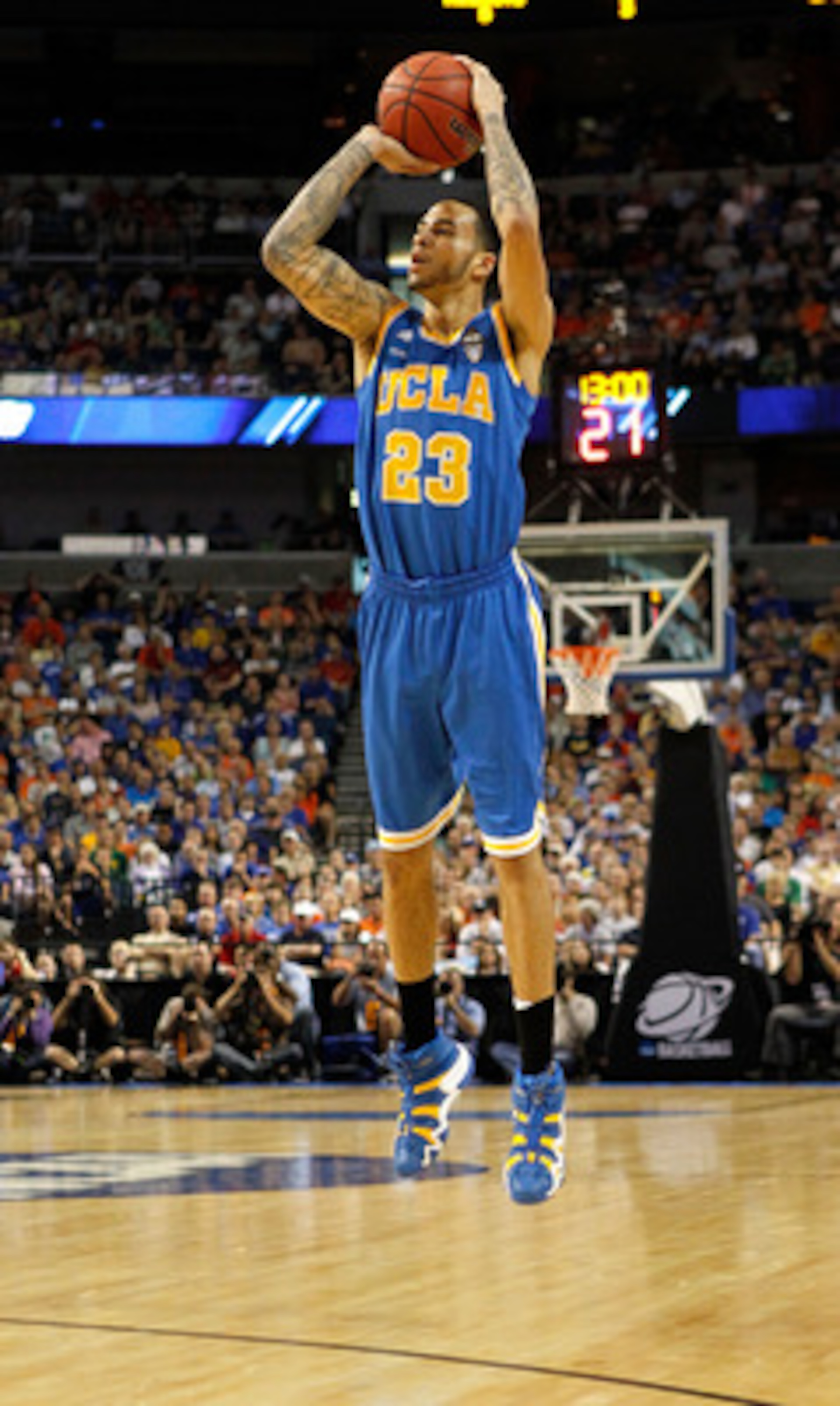 TAMPA, FL - MARCH 19: Tyler Honeycutt #23 of the UCLA Bruins attempts a shot agaisnt the Florida Gators during the third round of the 2011 NCAA men's basketball tournament at St. Pete Times Forum on March 19, 2011 in Tampa, Florida. Florida won 73-65. (P TAMPA, FL - MARCH 19: Tyler Honeycutt #23 of the UCLA Bruins attempts a shot agaisnt the Florida Gators during the third round of the 2011 NCAA men's basketball tournament at St. Pete Times Forum on March 19, 2011 in Tampa, Florida. Florida won 73-65. (P