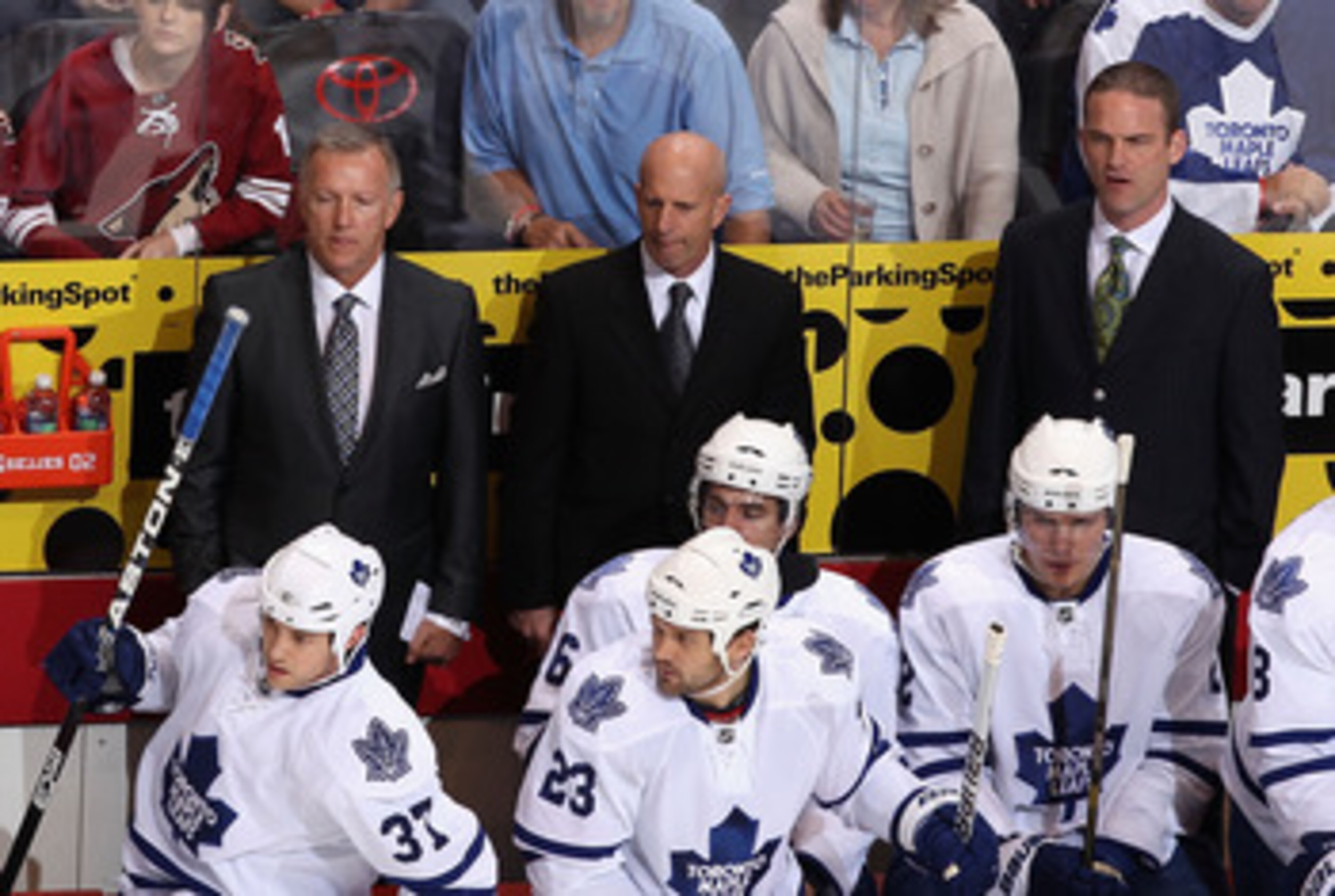 GLENDALE, AZ - JANUARY 13:  Coaches Ron Wilson, Keith Acton and Rob Zettler of the Toronto Maple Leafs during the NHL game against the Phoenix Coyotes at Jobing.com Arena on January 13, 2011 in Glendale, Arizona. The Coyotes defeated the Maple Leafs 5-1. 
