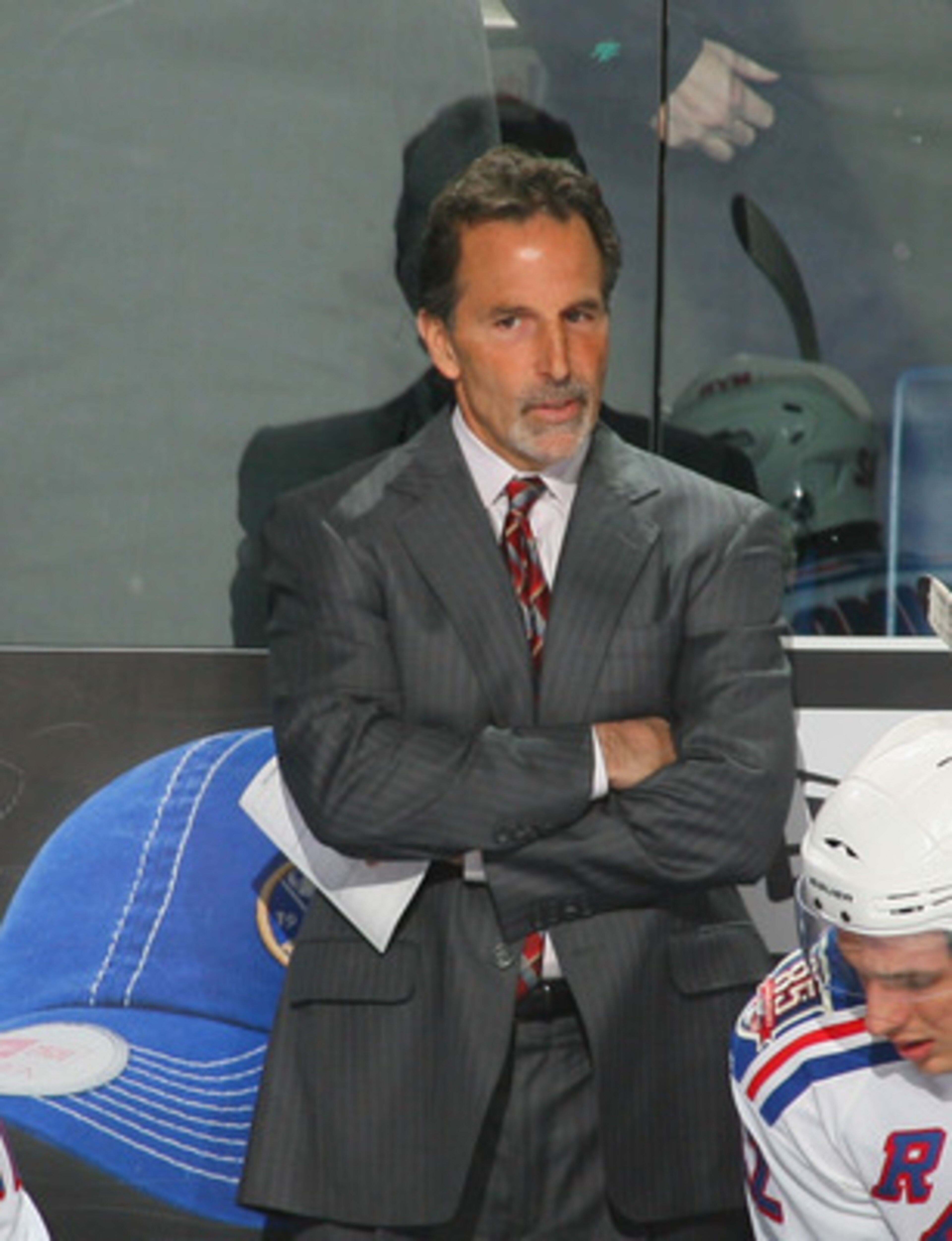 BUFFALO, NY - MARCH 30:  John Tortorella, head coach of the New York Rangers stands on the bench against the Buffalo Sabres at HSBC Arena on March 30, 2011 in Buffalo, New York.  (Photo by Rick Stewart/Getty Images)