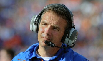 TAMPA, FL - JANUARY 1:  Coach Urban Meyer of the Florida Gators directs play against the Penn State Nittany Lions January 1, 2010 in the 25th Outback Bowl at Raymond James Stadium in Tampa, Florida.  (Photo by Al Messerschmidt/Getty Images)