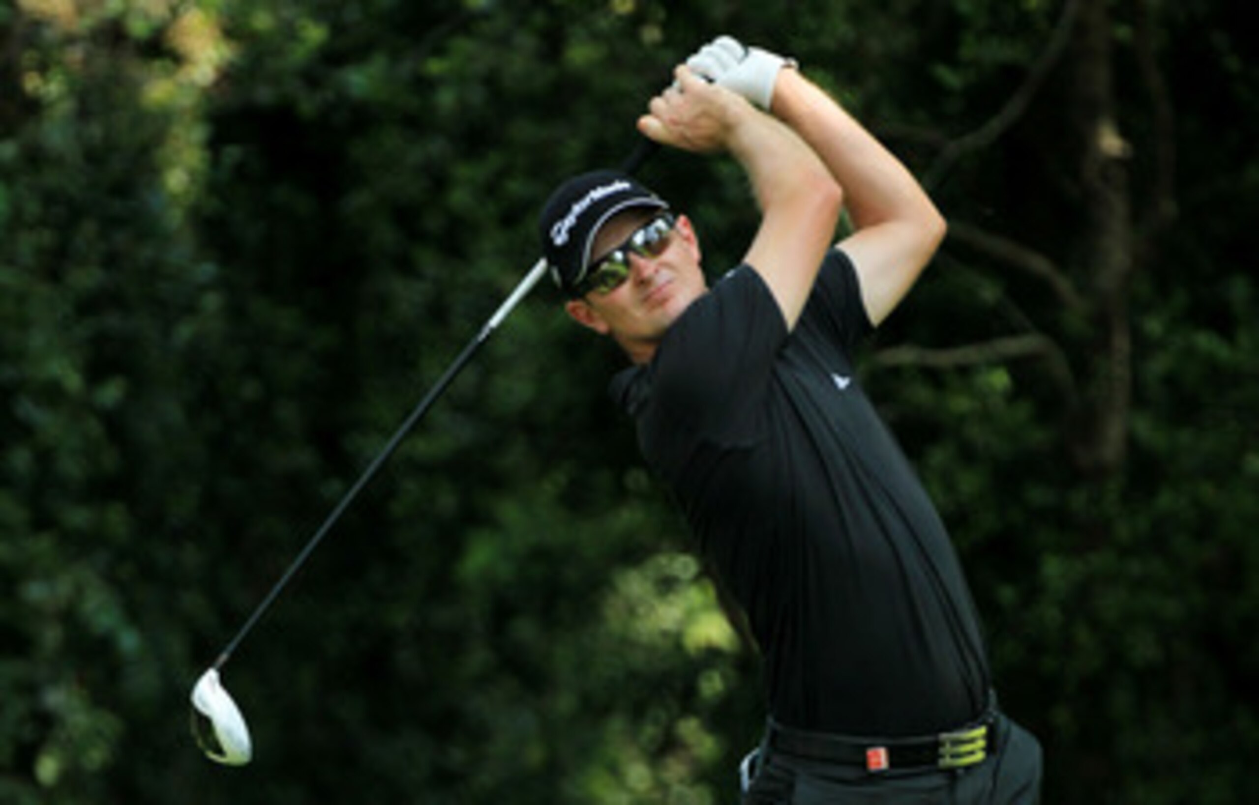 AUGUSTA, GA - APRIL 09:  Justin Rose of England watches his tee shot on the second hole during the third round of the 2011 Masters Tournament at Augusta National Golf Club on April 9, 2011 in Augusta, Georgia.  (Photo by David Cannon/Getty Images)