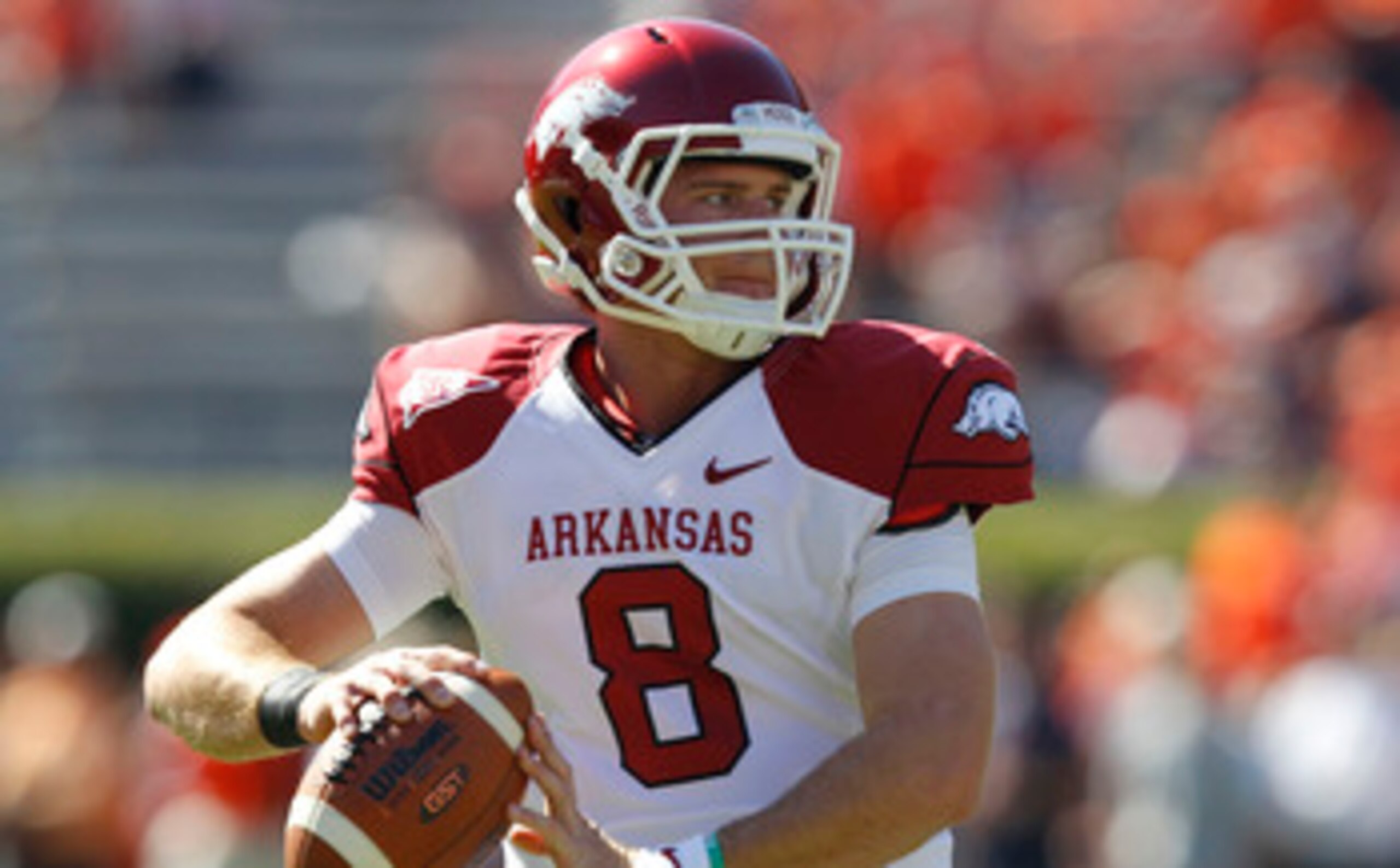 AUBURN, AL - OCTOBER 16:  Quarterback Tyler Wilson #8 of the Arkansas Razorbacks drops back and looks downfield before the game against the Auburn Tigers at Jordan-Hare Stadium on October 16, 2010 in Auburn, Alabama.  The Tigers beat the Razorbacks 65-43.