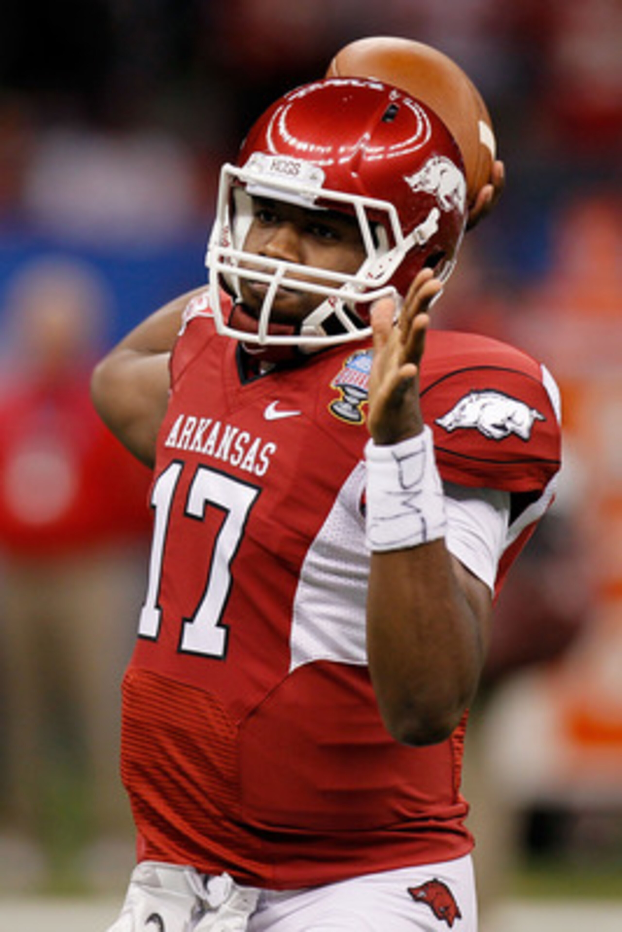 NEW ORLEANS, LA - JANUARY 04:  Brandon Mitchell #17 of the Arkansas Razorbacks warms up before taking on the Ohio State Buckeyes during the Allstate Sugar Bowl at the Louisiana Superdome on January 4, 2011 in New Orleans, Louisiana.  (Photo by Kevin C. Co