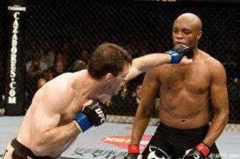 Anderson Silva defending punches