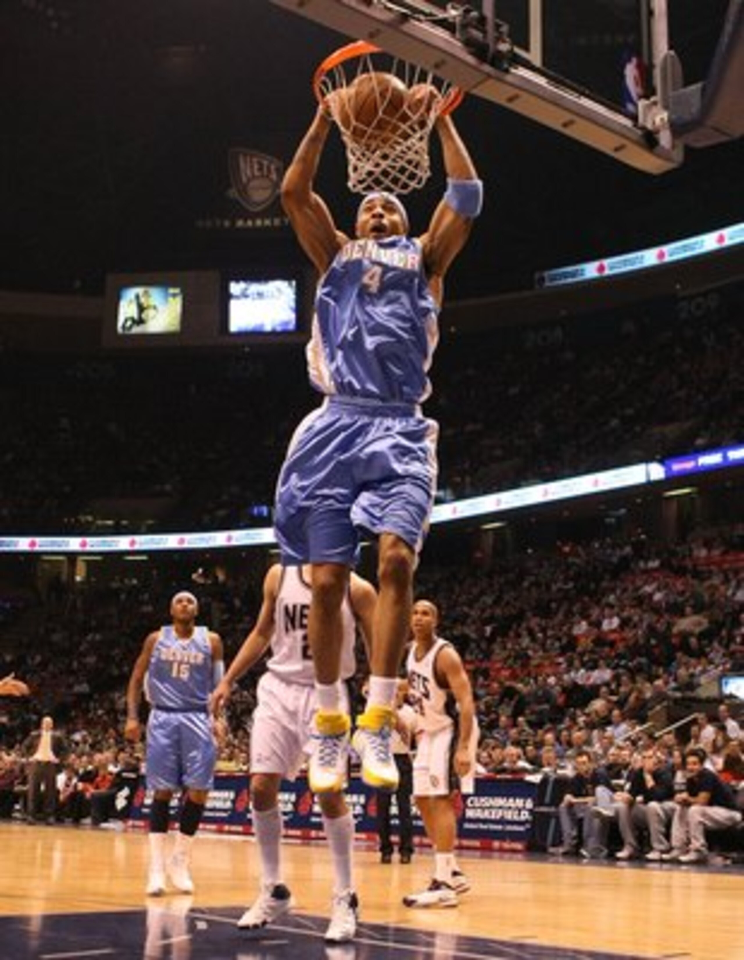 EAST RUTHERFORD, NJ - MARCH 21:  Kenyon Martin #4 of the Denver Nuggets dunks against the New Jersey Nets during their game on March 21, 2008 at the Izod Arena in East Rutherford, New Jersey.  Photo By Al Bello/Getty Images.  NOTE TO USER: User expressly 
