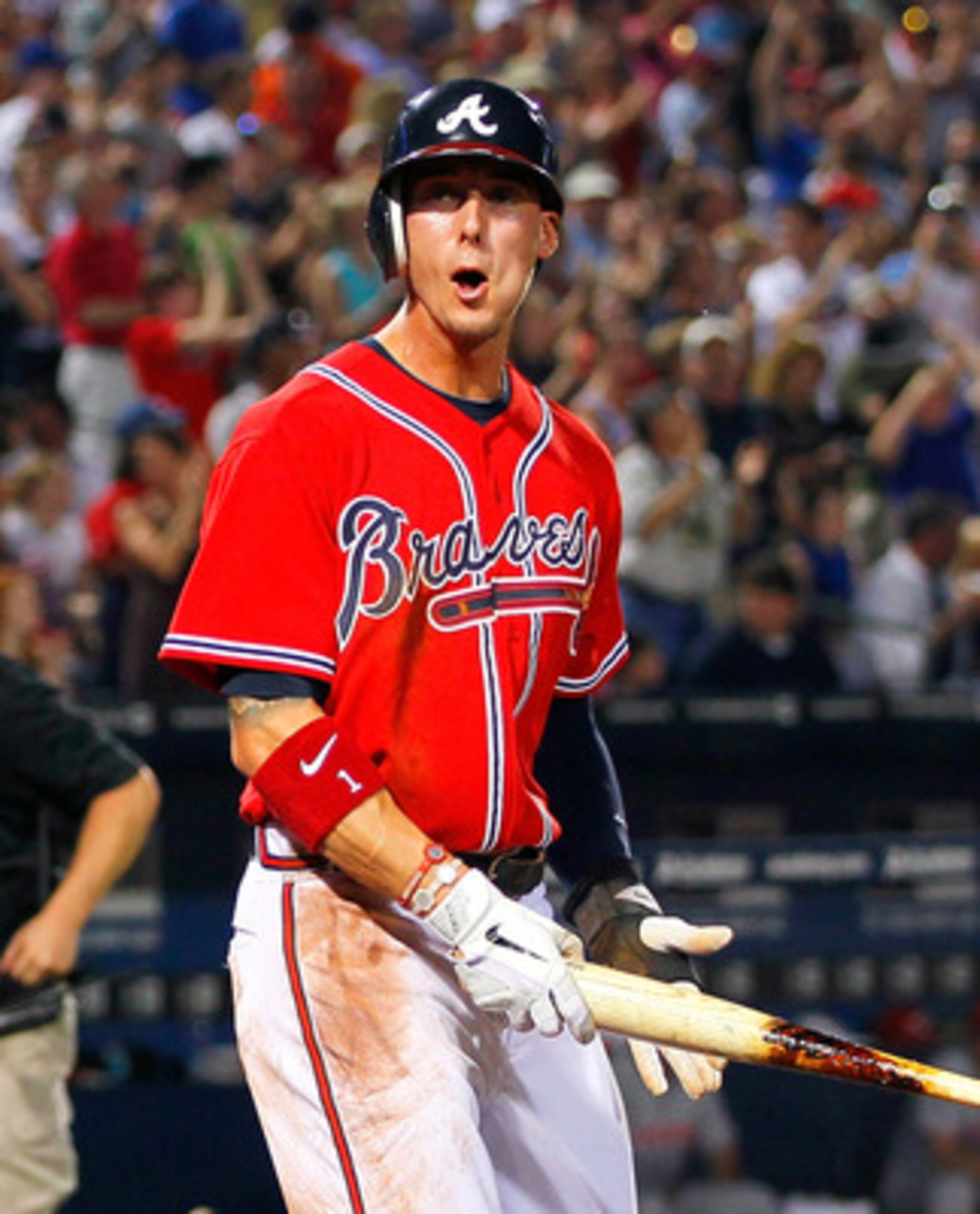 ATLANTA, GA - MAY 29:  Martin Prado #14 of the Atlanta Braves reacts after hitting a two-run homer in the sixth inning that also scored Jordan Schafer #1 against the Cincinnati Reds at Turner Field on May 29, 2011 in Atlanta, Georgia.  (Photo by Kevin C.
