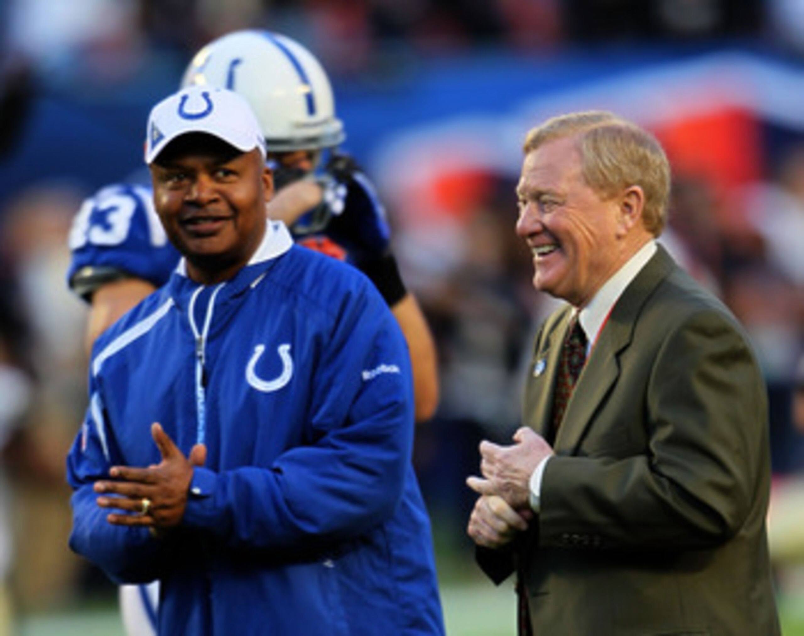 MIAMI GARDENS, FL - FEBRUARY 07:  Head Coach Jim Caldwell (L) of the Indianapolis Colts stands on the field during warm ups with President of the Indianapolis Colts Bill Polian prior to Super Bowl XLIV against the New Orleans Saints on February 7, 2010 at