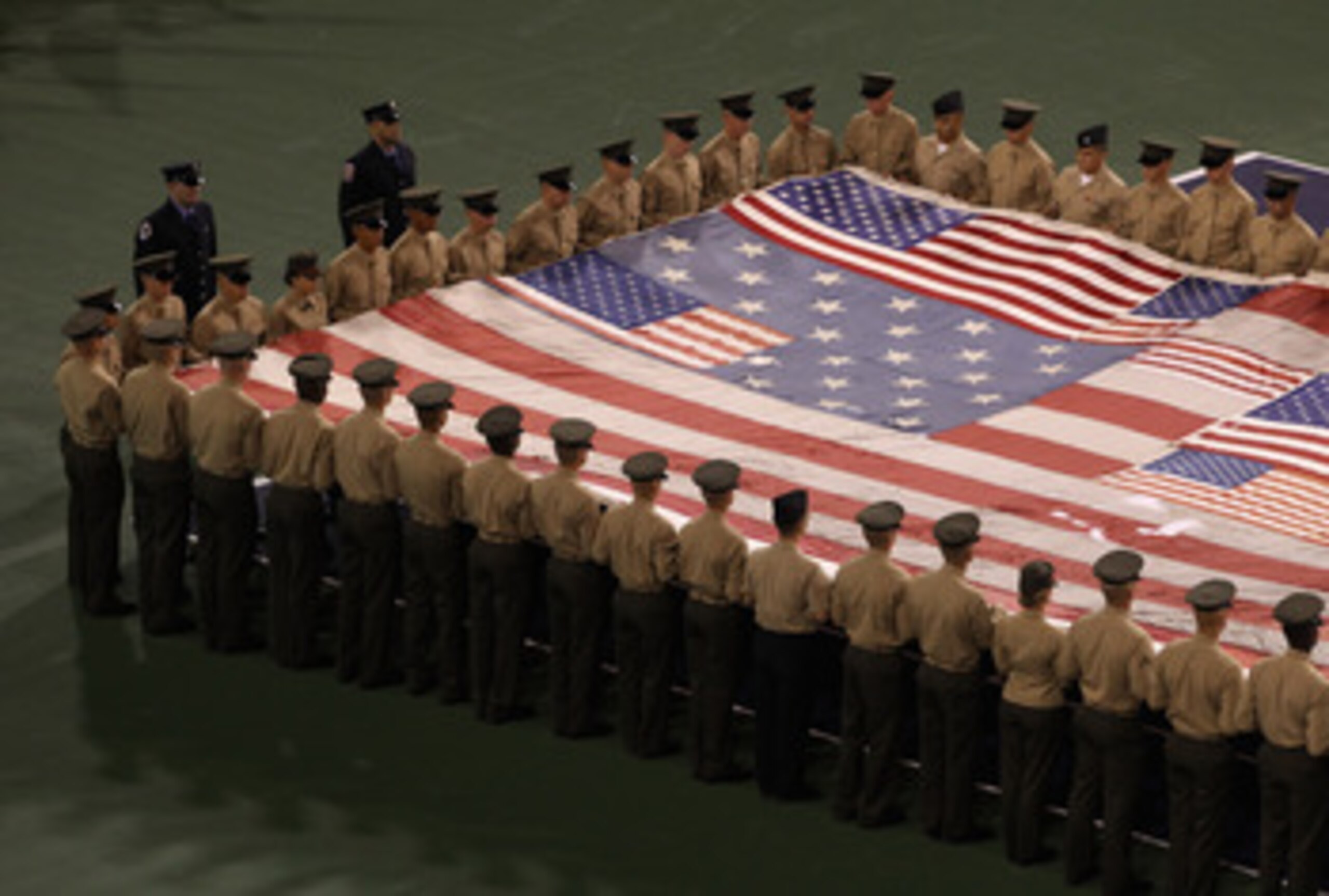 INDIAN WELLS, CA - MARCH 11:  The National 9/11 flag is displayed during the playing of the National Anthem before the night session of the BNP Paribas Open at the Indian Wells Tennis Garden on March 11, 2011 in Indian Wells, California. The flag was dest