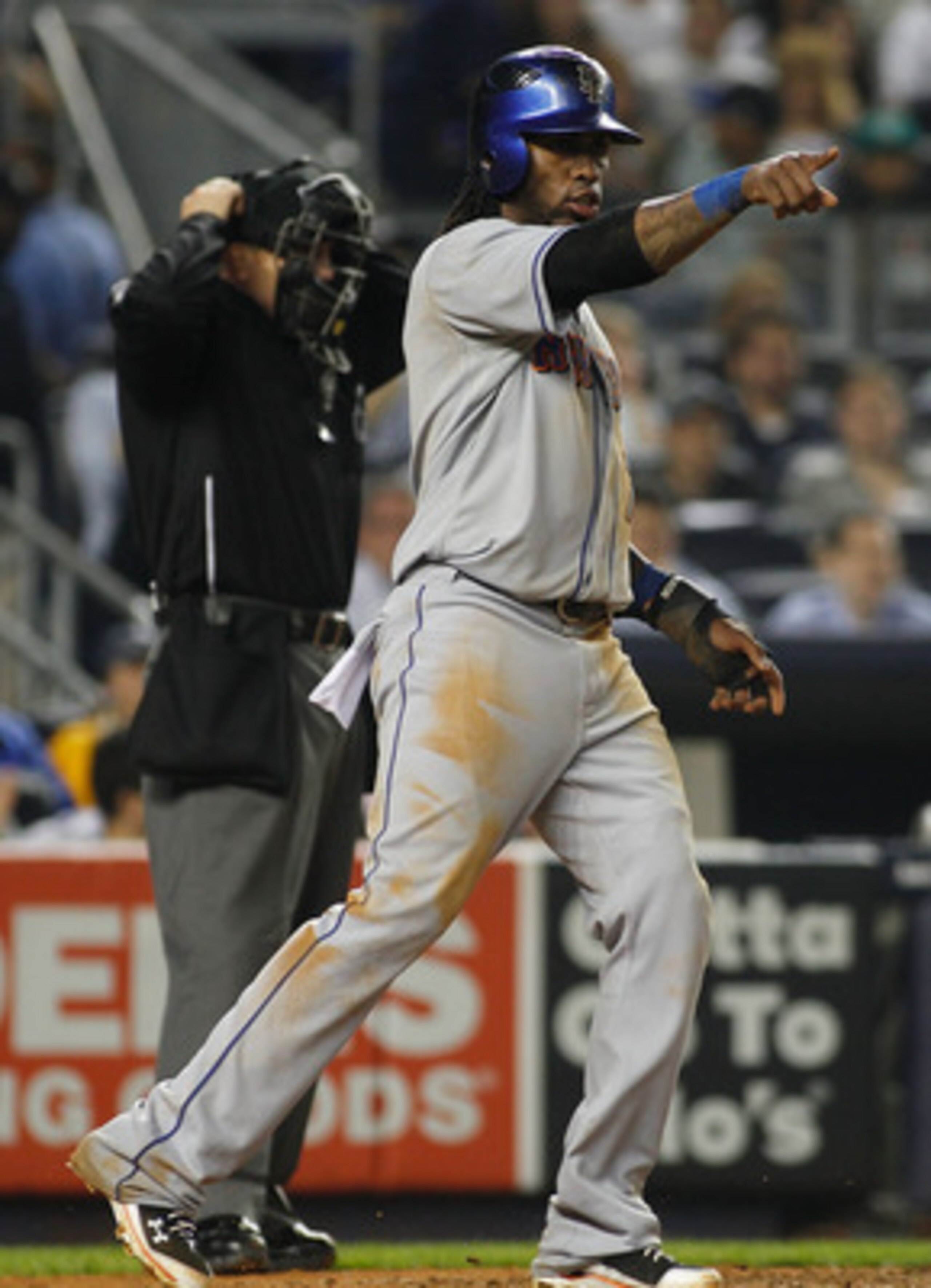 NEW YORK - MAY 21:  Jose Reyes #7 of the New York Mets celebrates after scoring on teammates Carlos Beltran #15 (not pictured) RBI single in the top of the fifth inning against the New York Yankees on May 21, 2011 at Yankee Stadium in the Bronx borough of