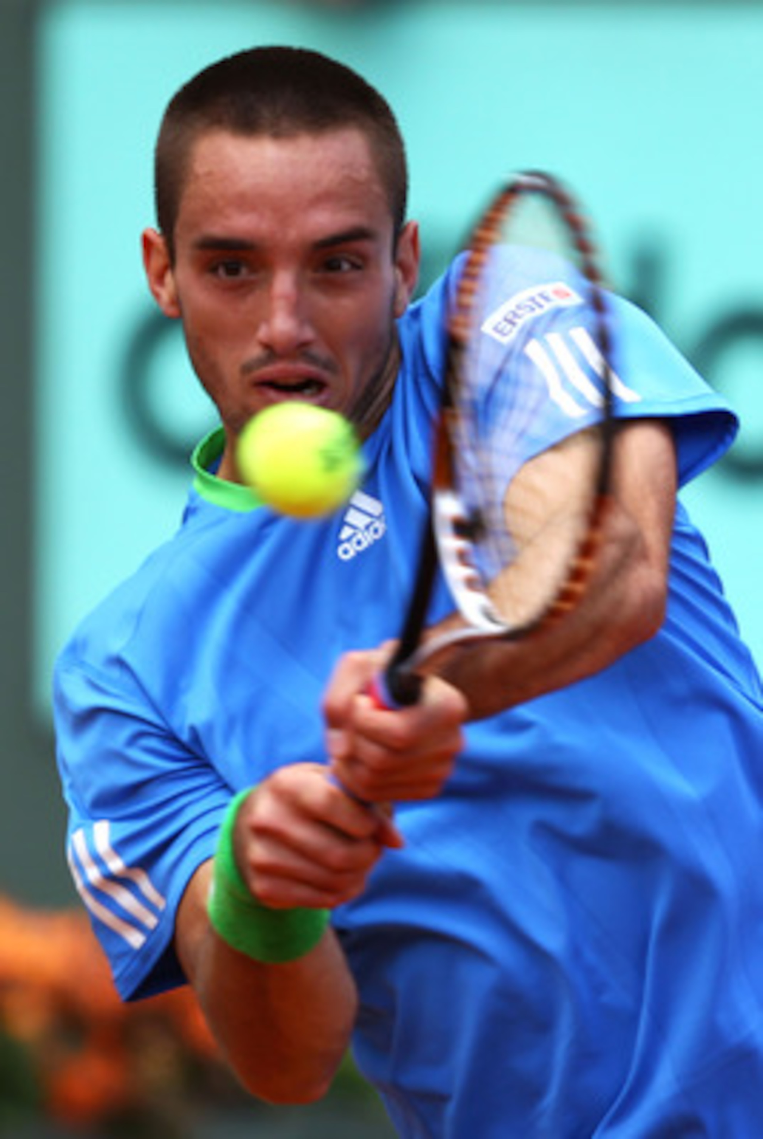 PARIS, FRANCE - MAY 31:  Viktor Troicki of Serbia hits a backhand during the men's singles round four match between Andy Murray of Great Britain and Viktor Troicki of Serbia on day ten of the French Open at Roland Garros on May 31, 2011 in Paris, France.
