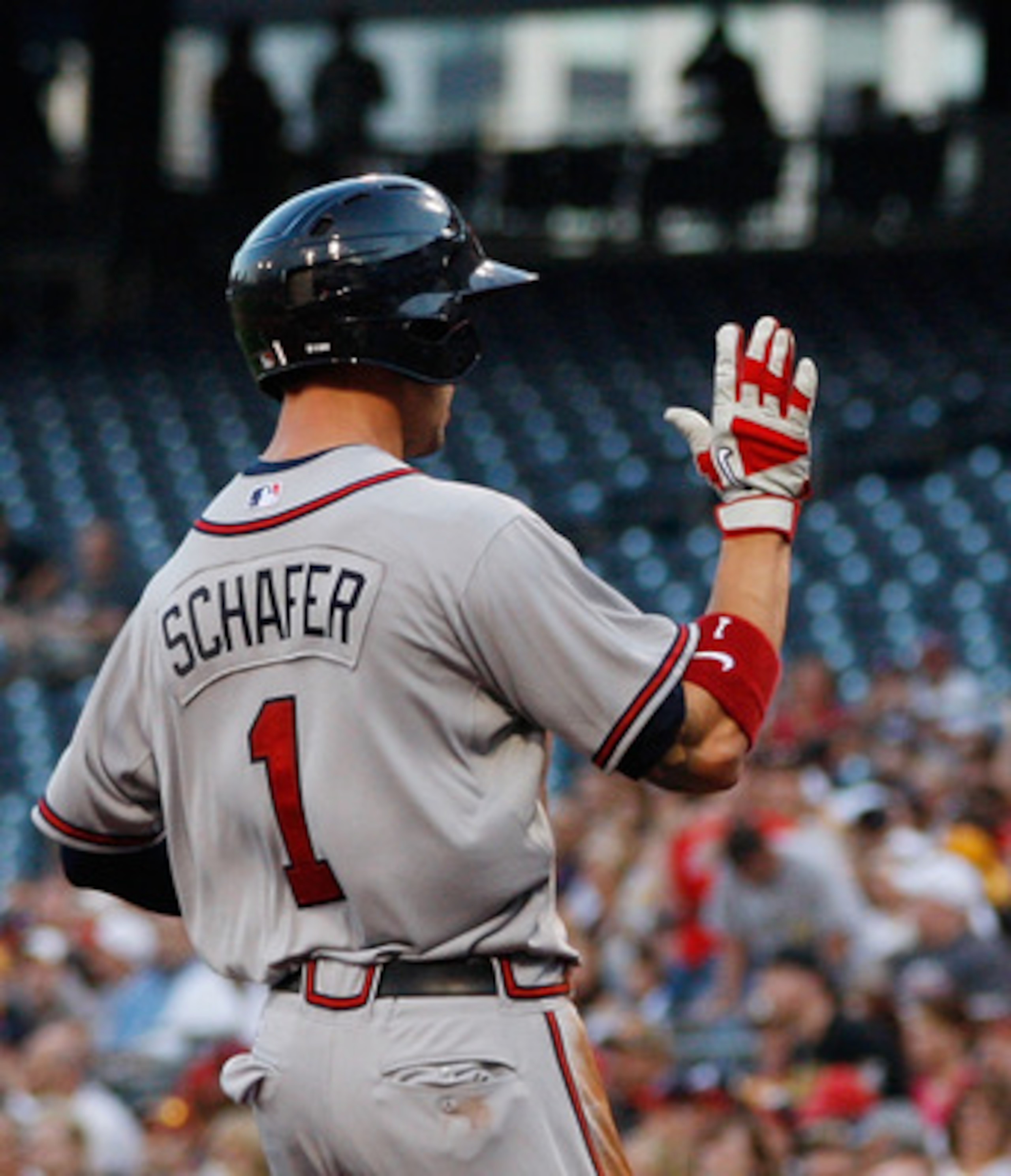 PITTSBURGH - MAY 24:  Jordan Schafer #1 of the Atlanta Braves is congratulated by teammate Chipper Jones #10 after scoring against the Pittsburgh Pirates during the game on May 24, 2011 at PNC Park in Pittsburgh, Pennsylvania.  (Photo by Jared Wickerham/G