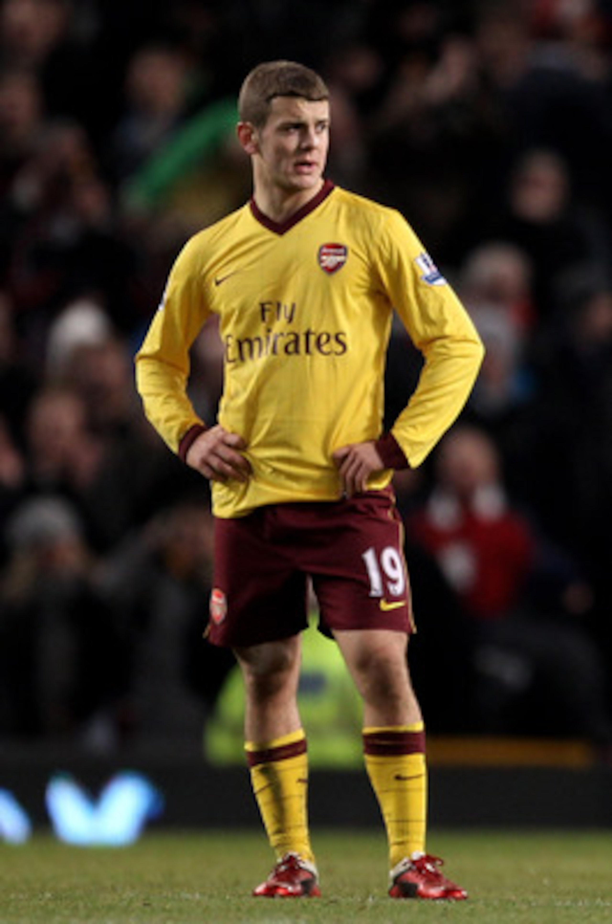 MANCHESTER, ENGLAND - DECEMBER 13:  Jack Wilshere (L) of Arsenal and his team mates look on after conceding the opening goal during the Barclays Premier League match between Manchester United and Arsenal at Old Trafford on December 13, 2010 in Manchester,