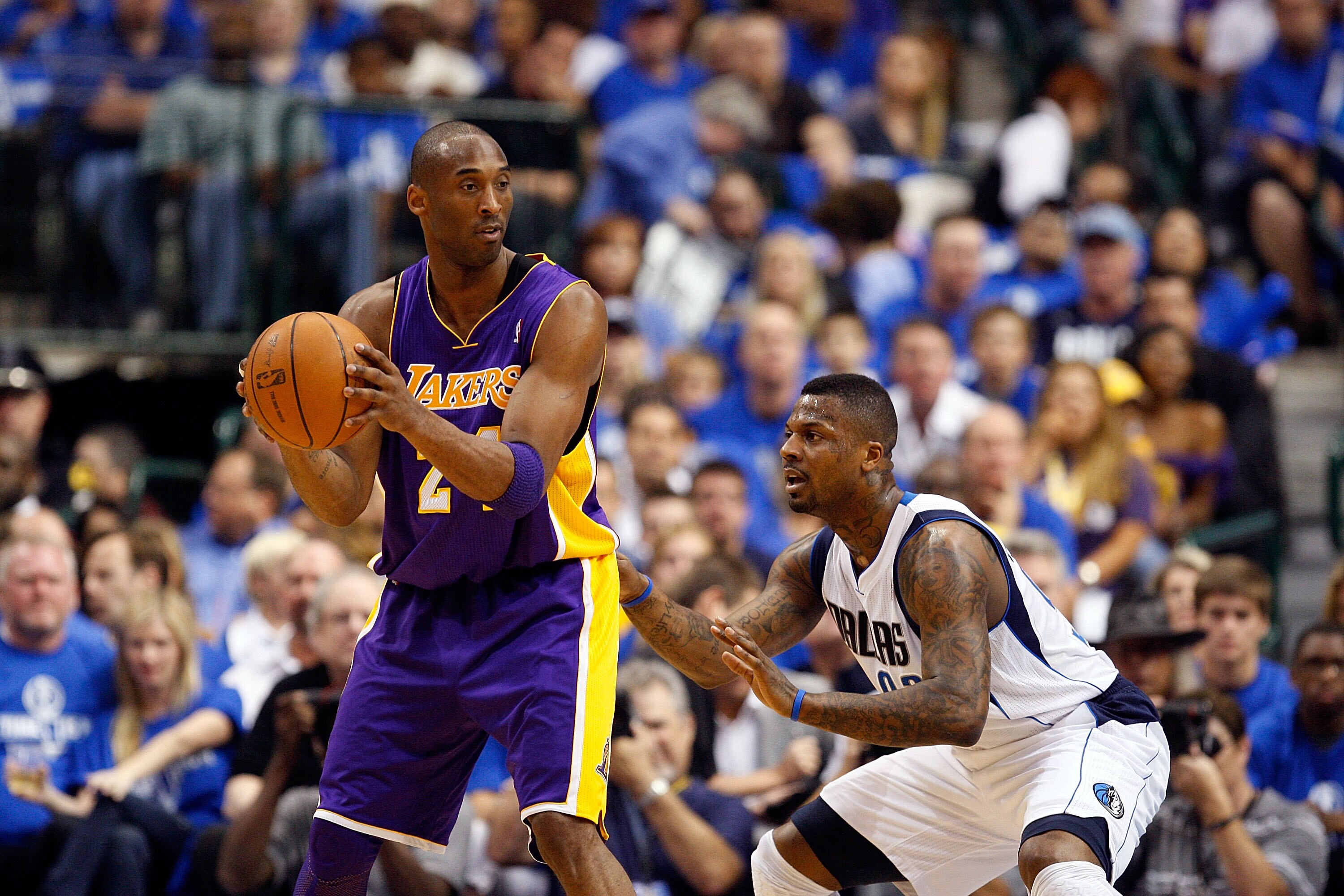 DALLAS, TX - MAY 06:  Guard Kobe Bryant #24 of the Los Angeles Lakers moves the ball against DeShawn Stevenson #92 of the Dallas Mavericks in Game Three of the Western Conference Semifinals during the 2011 NBA Playoffs on May 6, 2011 at American Airlines