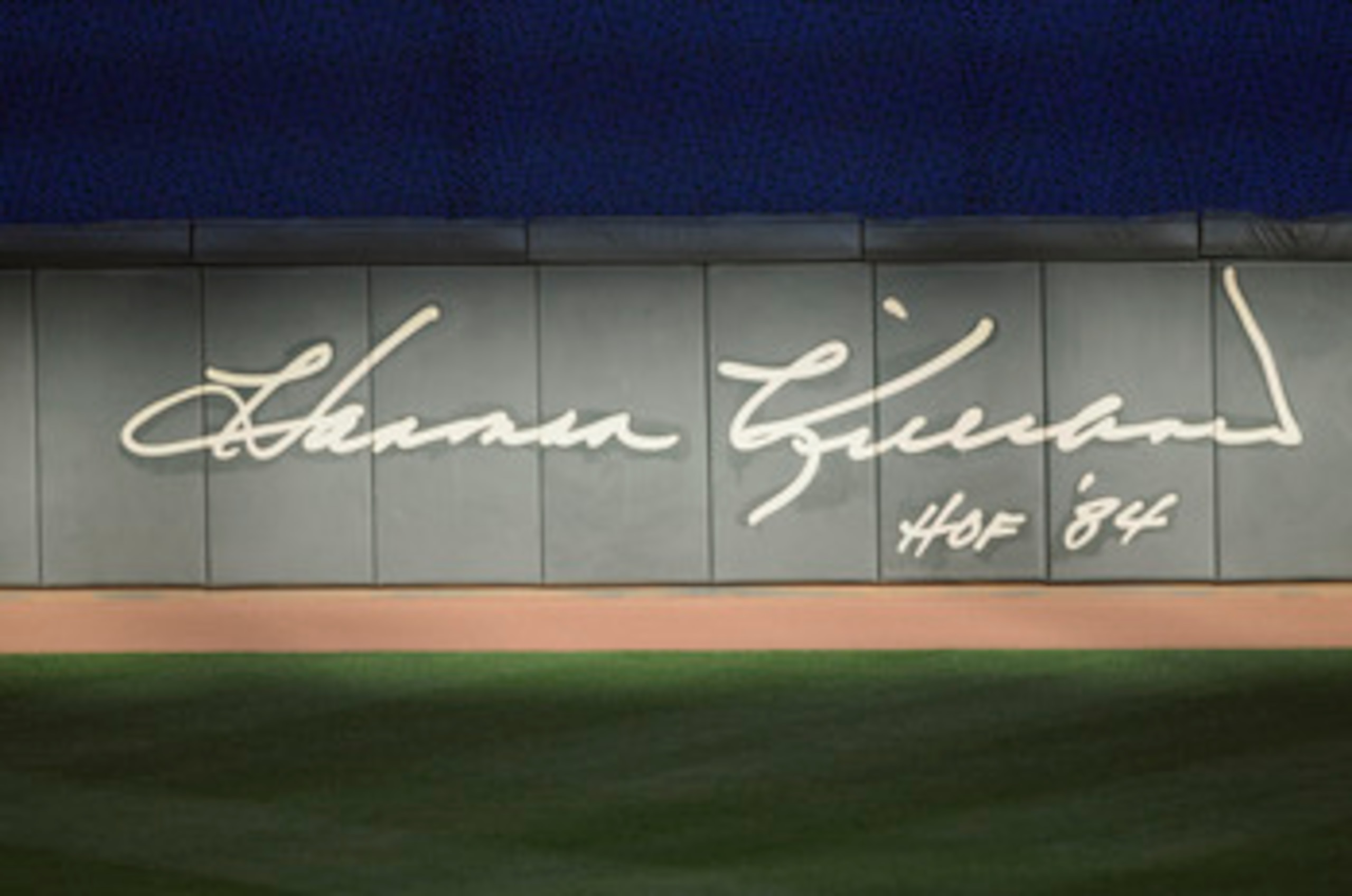 MINNEAPOLIS, MN - MAY 23: Hall of Famer Harmon Killebrew's autograph on the outfield wall of Target Field on May 23, 2011 in Minneapolis, Minnesota. Harmon Killebrew passed away on May 17, 2011 after a battle with esophageal cancer. (Photo by Hannah Fosli
