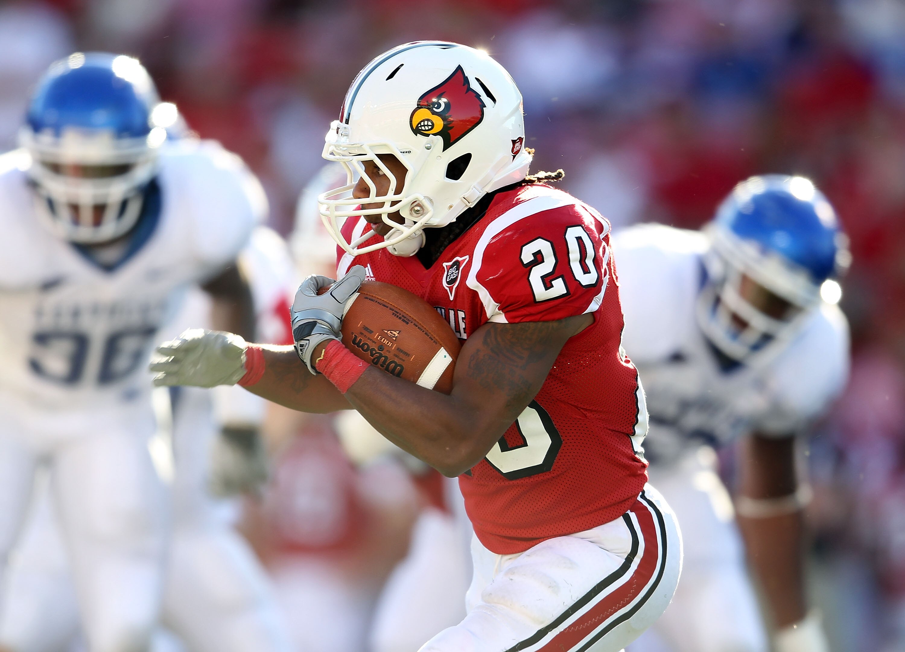 LOUISVILLE, KY - SEPTEMBER 04: Victor Anderson #20 of the Louisville Cardinals runs with the ball during the game against the Kentucky Wildcats at Papa John's Cardinal Stadium on September 4, 2010 in Louisville, Kentucky.  (Photo by Andy Lyons/Getty Image