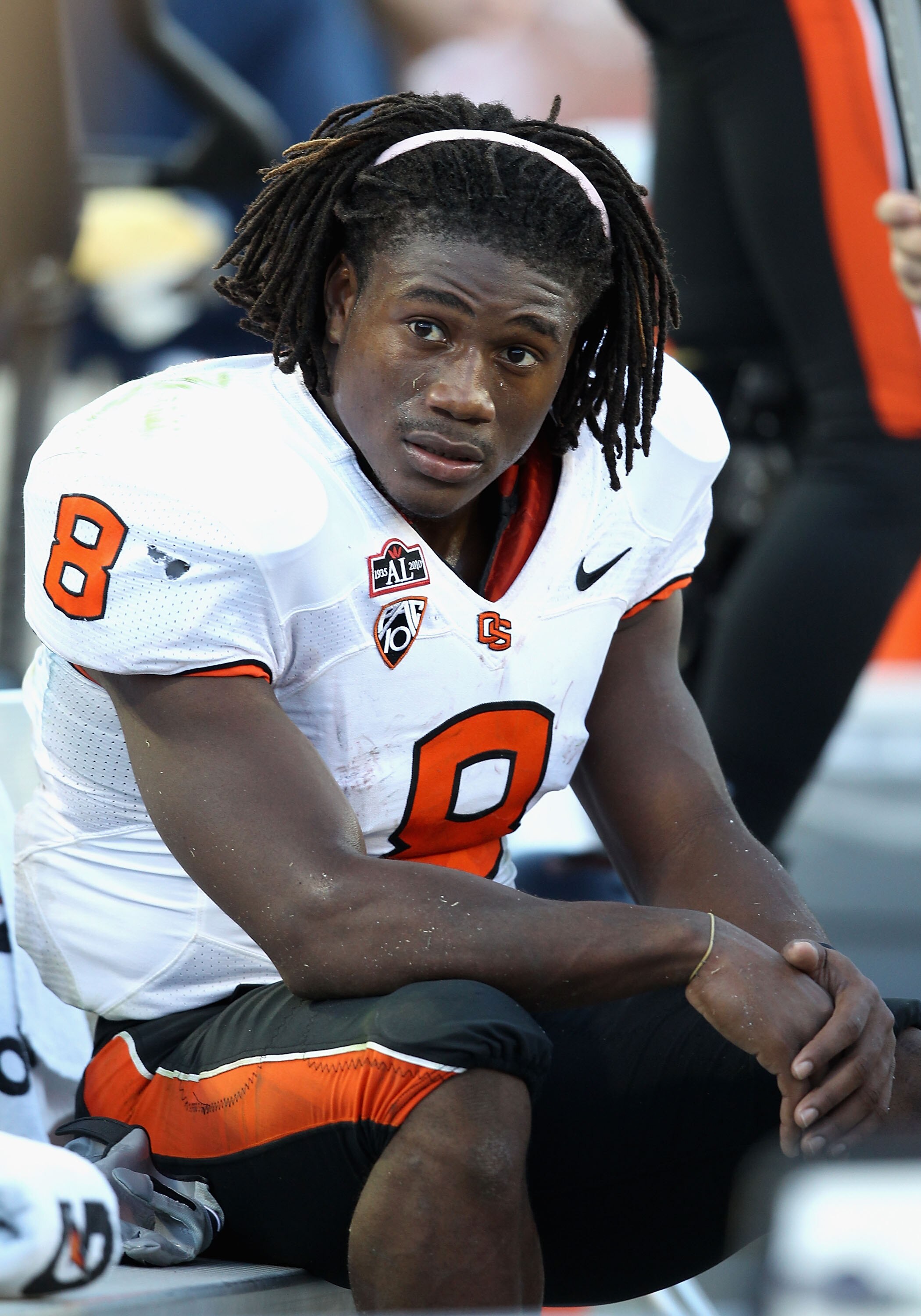 TUCSON, AZ - OCTOBER 09:  Wide receiver James Rodgers #8 of the Oregon State Beavers sits on the sidelines during the college football game against the Arizona Wildcats at Arizona Stadium on October 9, 2010 in Tucson, Arizona.  (Photo by Christian Peterse