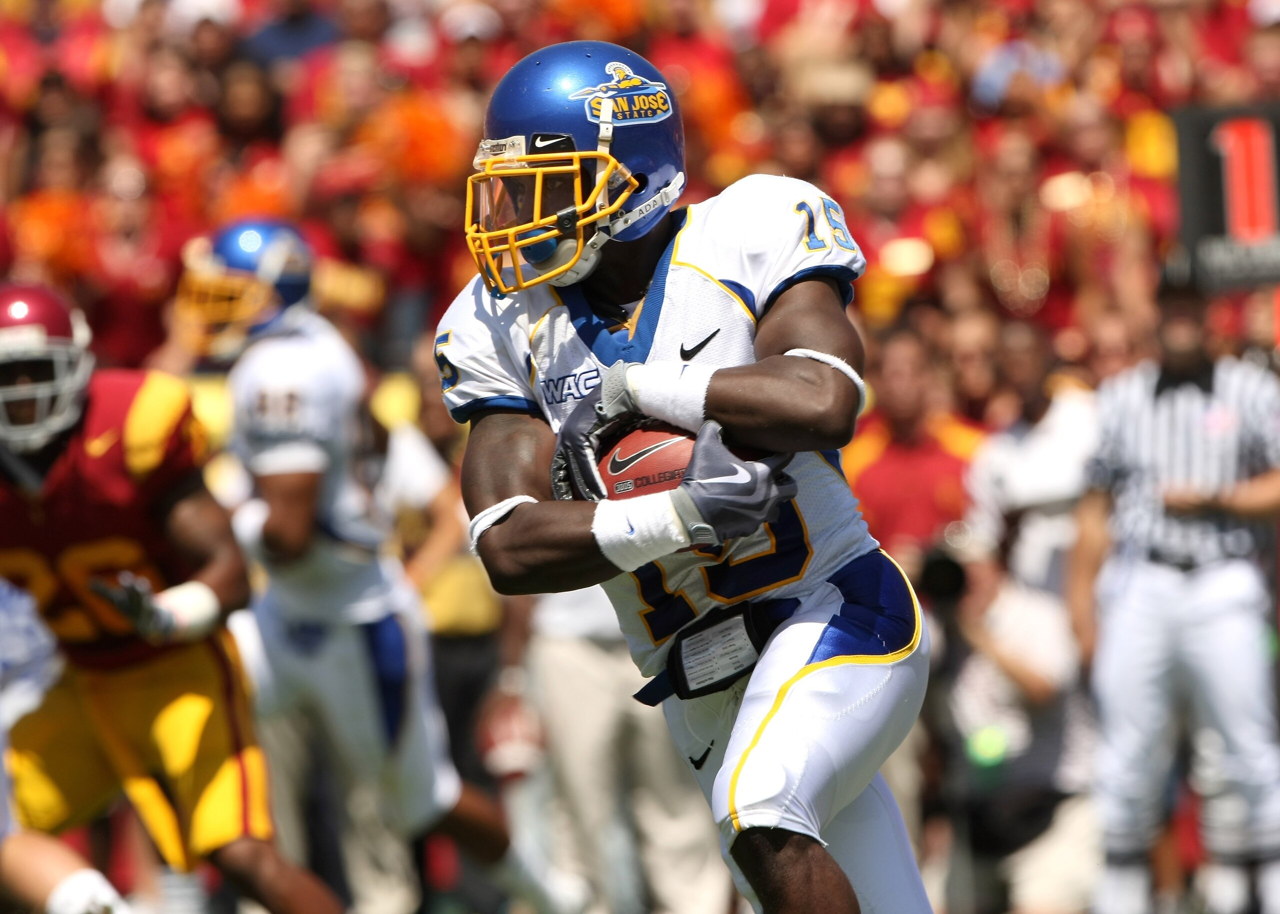 LOS ANGELES, CA - SEPTEMBER 05:  Running back Brandon Rutley #15 of the San Jose State Spartans  carries the ball against the USC Trojans at the Los Angeles Coliseum in Los Angeles, California.   USC won 56-3.  (Photo by Stephen Dunn/Getty Images)