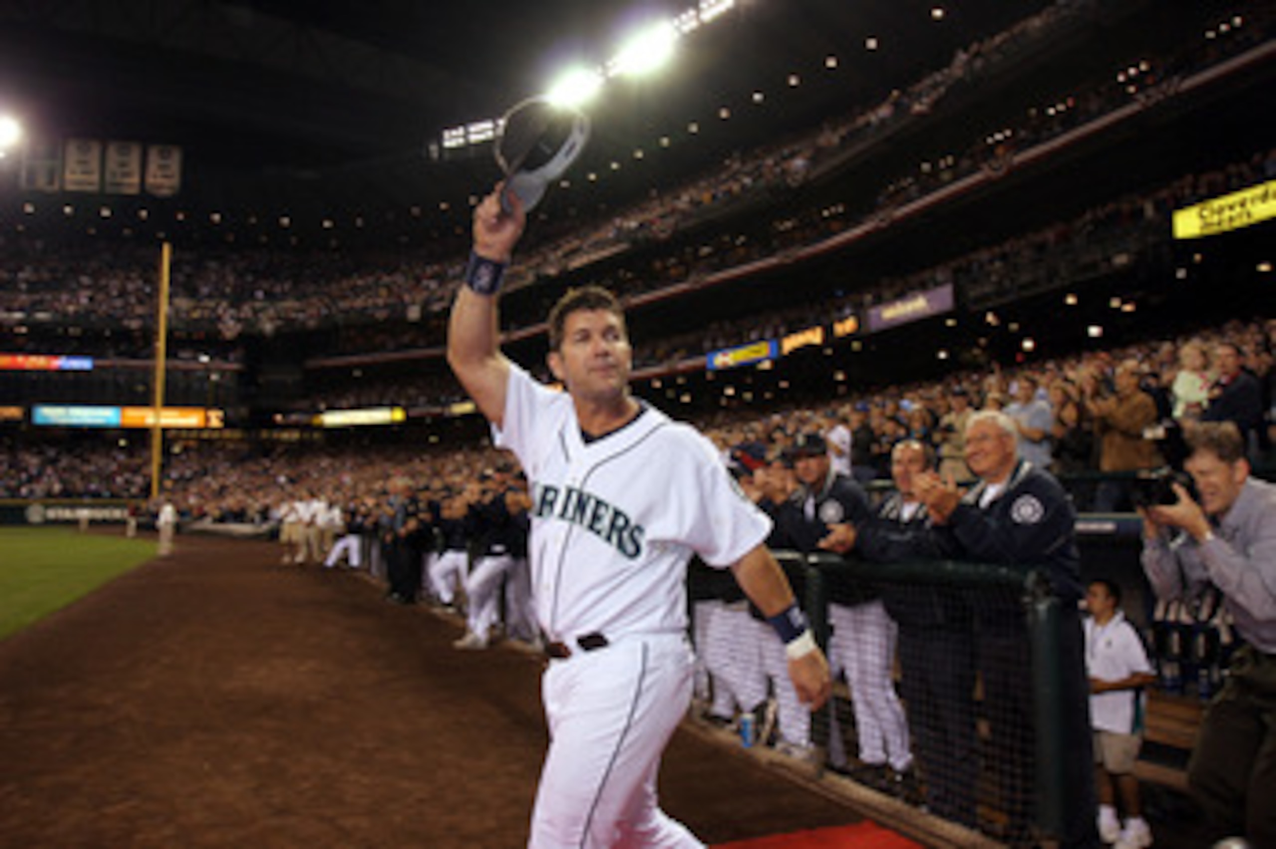 SEATTLE - OCTOBER 2:  Edgar Martinez #11 of the Seattle Mariners waves to fans as he takes the field during a post game ceremony honoring his career as a Mariner after the game against the Seattle Mariners on October 2, 2004 at Safeco Field in Seattle, Wa