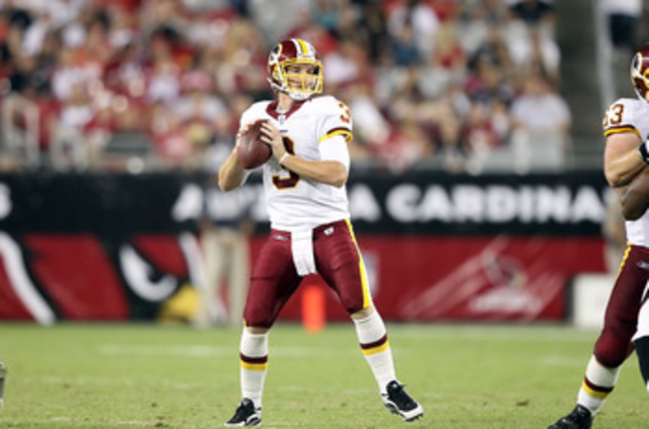 LANDOVER, MD - NOVEMBER 15:  Michael Vick #7 of the Philadelphia Eagles makes a break past Brian Orakpo #98 of the Washington Redskins on November 15, 2010 at FedExField in Landover, Maryland.  (Photo by Chris McGrath/Getty Images)