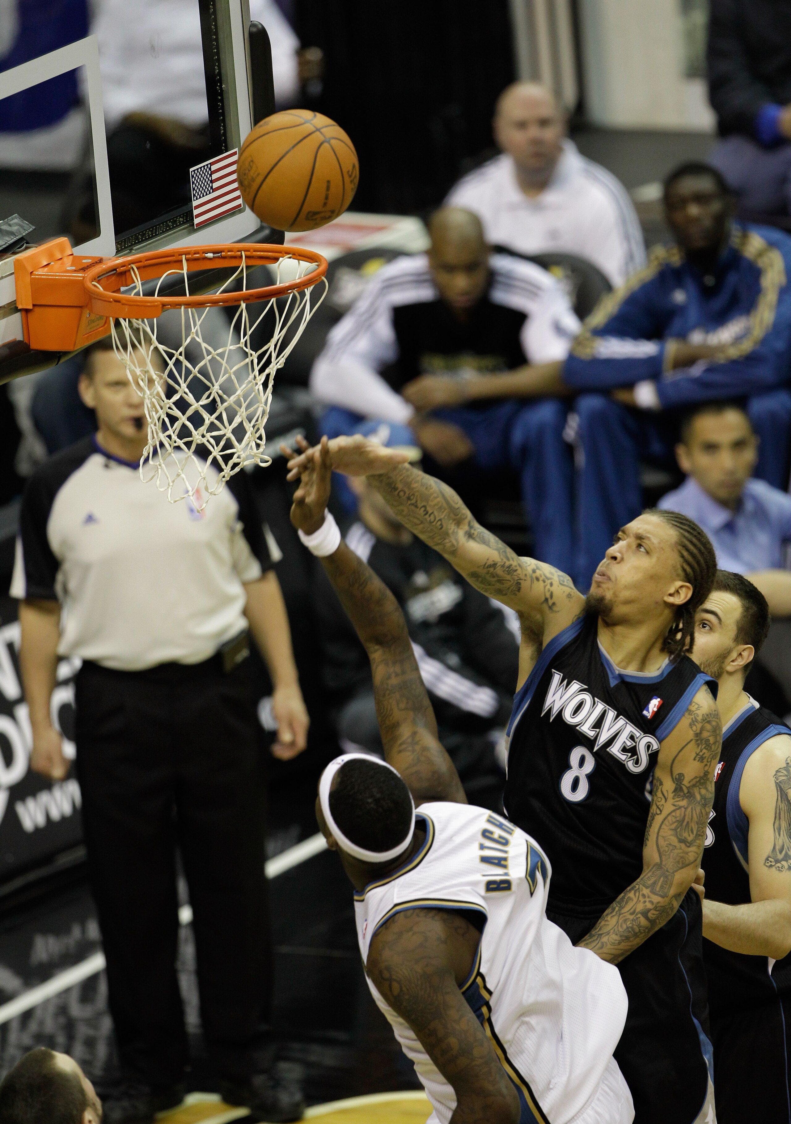 WASHINGTON, DC - MARCH 05:  Michael Beasley #8 of the Minnesota Timberwolves blocks a shot by Andray Blatche #7 of the Washington Wizards at the Verizon Center on March 5, 2011 in Washington, DC. NOTE TO USER: User expressly acknowledges and agrees that,