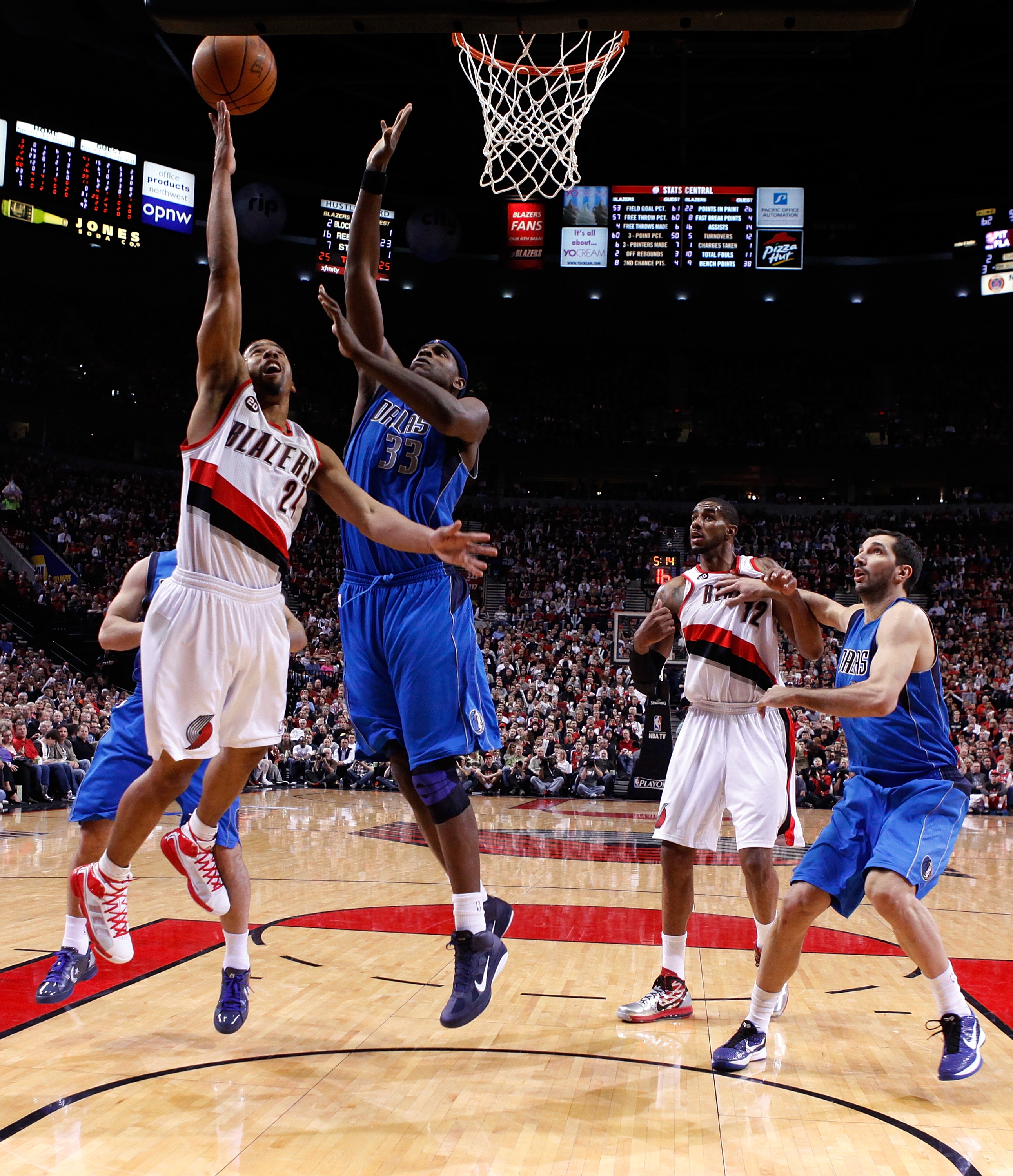 PORTLAND, OR - APRIL 21:  Andre Miller #24 of the Portland Trail Blazers shoots the ball against Brendan Haywood #33 of the Dallas Mavericks in Game Three of the Western Conference Quarterfinals in the 2011 NBA Playoffs on April 21, 2011 at the Rose Garde