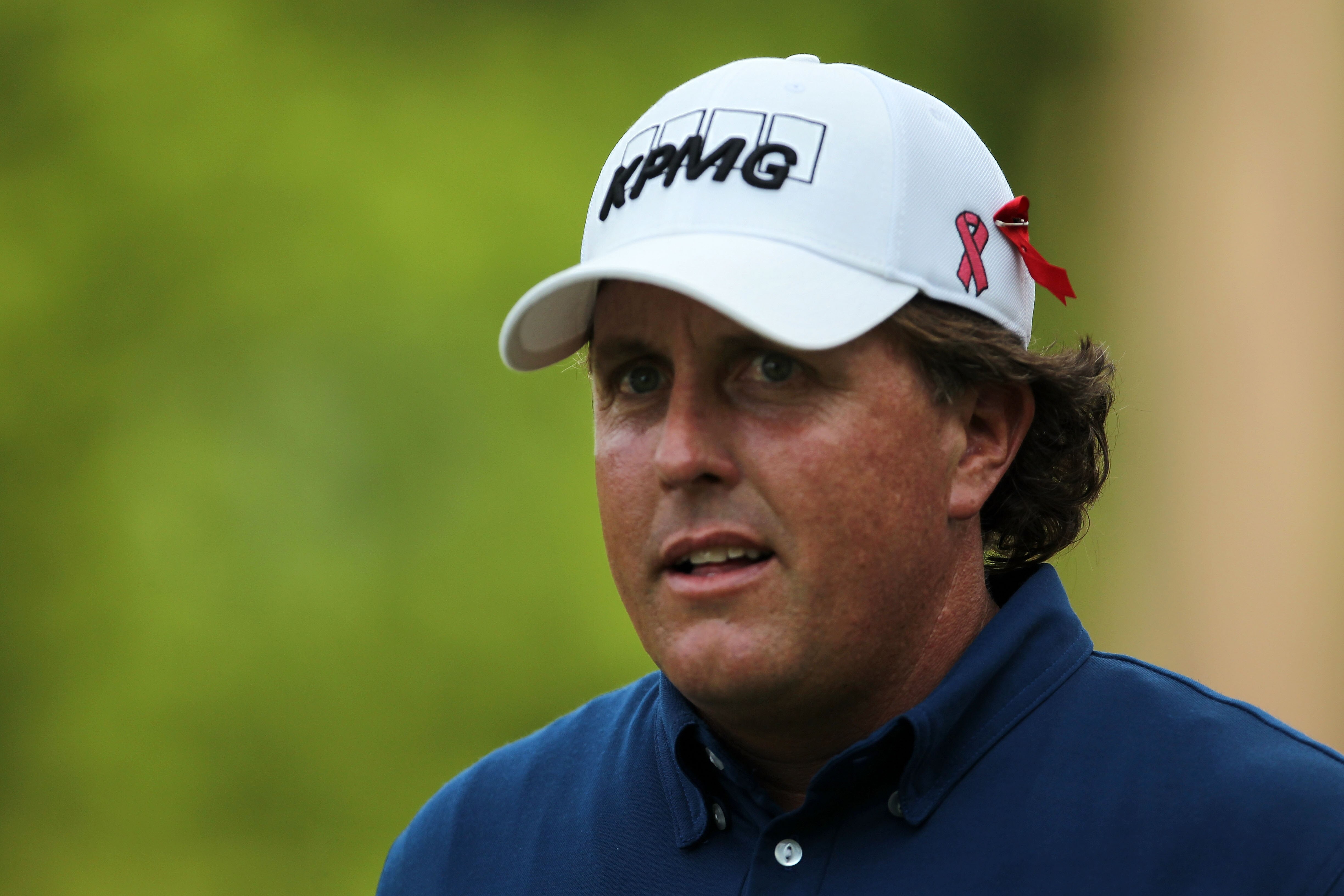PONTE VEDRA BEACH, FL - MAY 14:  Phil Mickelson looks on from the ninth hole during the third round of THE PLAYERS Championship held at THE PLAYERS Stadium course at TPC Sawgrass on May 14, 2011 in Ponte Vedra Beach, Florida.  (Photo by Mike Ehrmann/Getty