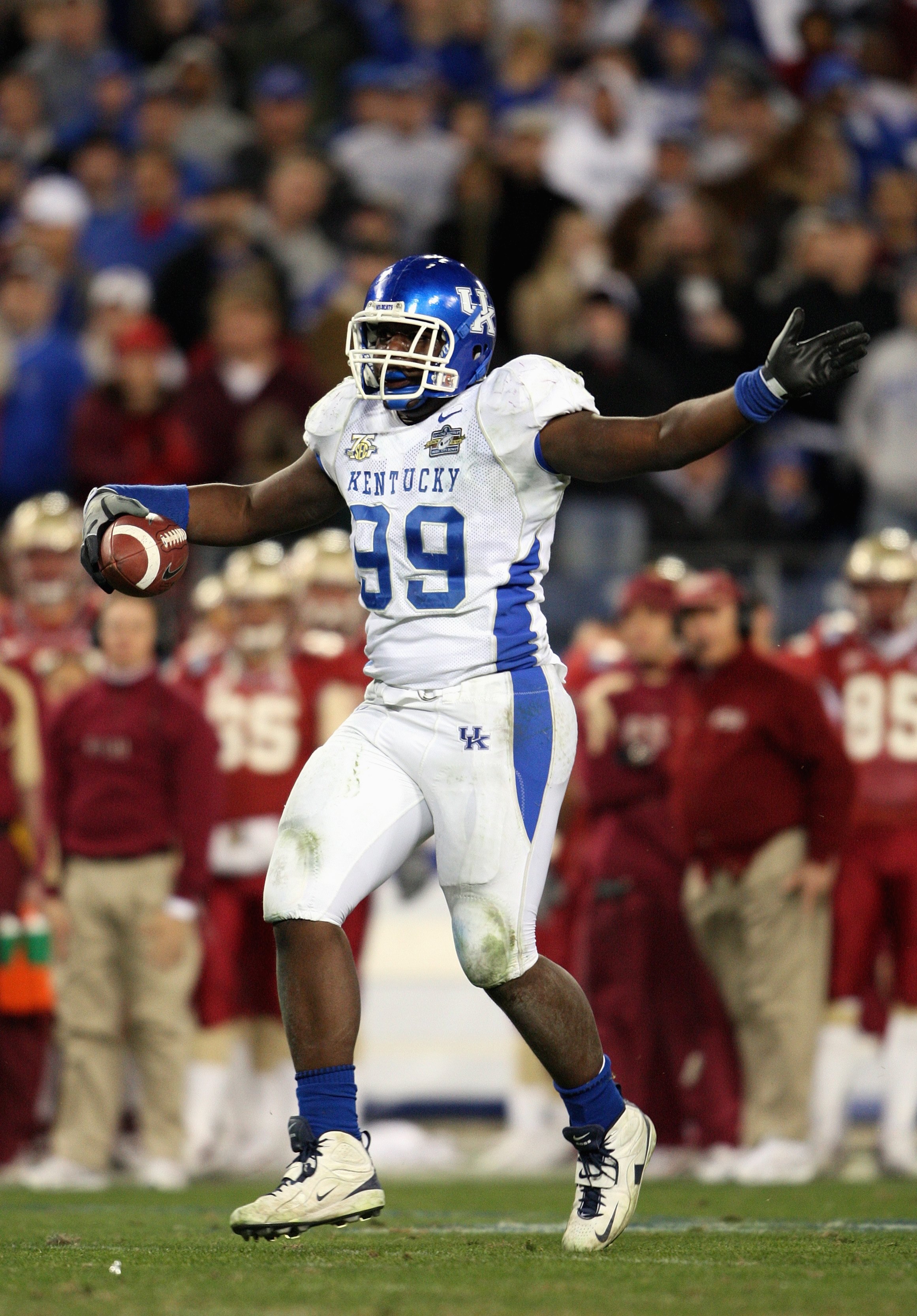 NASHVILLE - DECEMBER 31: Jeremy Jarmon #99 of the Kentucky Wildcats catches the ball during the Gaylord Hotels Music City Bowl against the Florida State Seminoles on December 31, 2007 at the LP Field in Nashville, Tennessee. (Photo by: Andy Lyons/Getty Im
