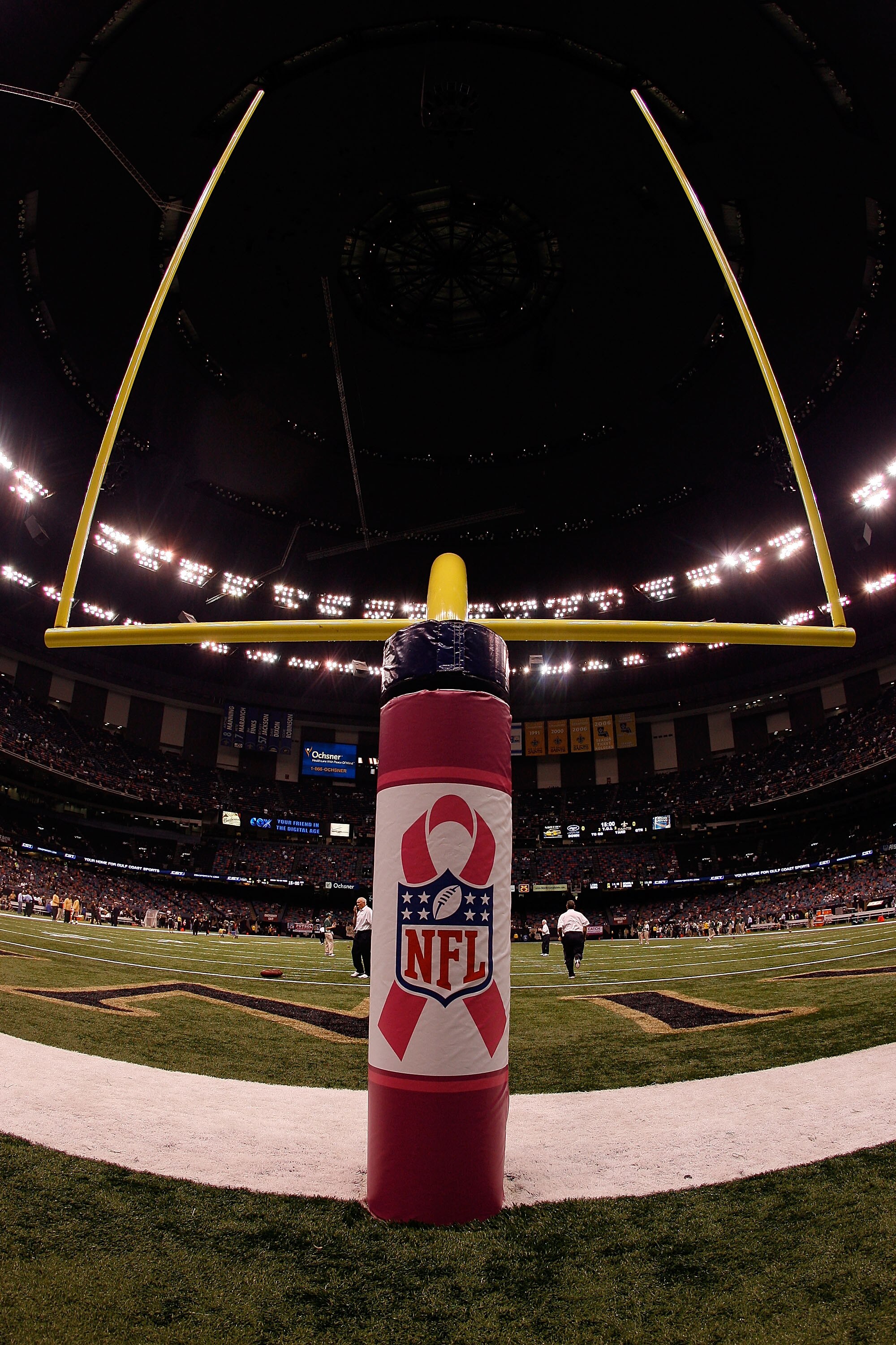 NEW ORLEANS - OCTOBER 04:  A pad protecting the field goal posts has a pink ribbon supporting Breast Cancer Awareness on the field before the New Orleans Saints play the New York Jets at the Louisana Superdome on October 4, 2009 in New Orleans, Louisiana.