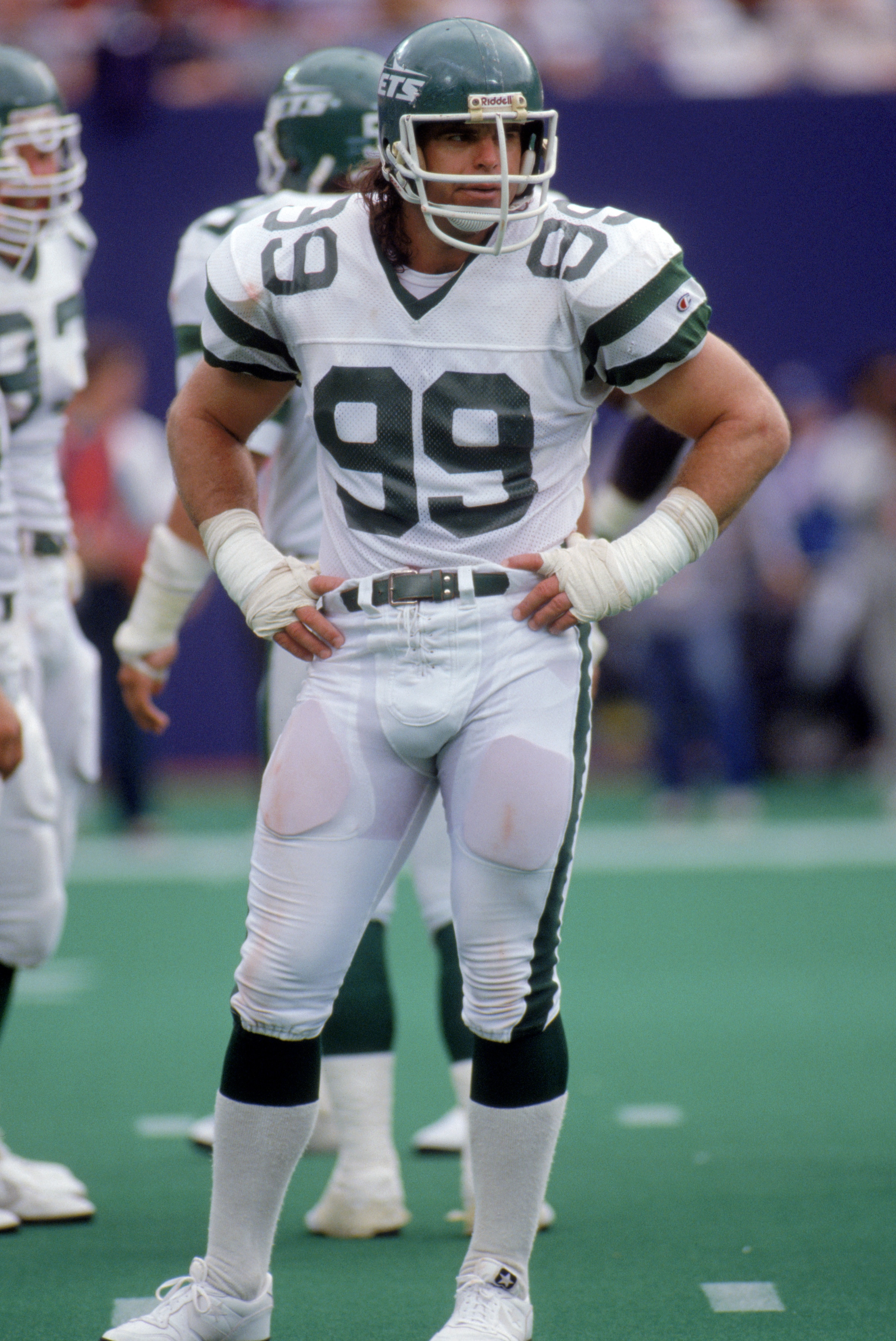SEPTEMBER - 1988:  Defensive end Mark Gastineau #99 of the New York Jets looks on from the sidelines during a game circa September of 1988.  (Photo by Scott Halleran/Getty Images)