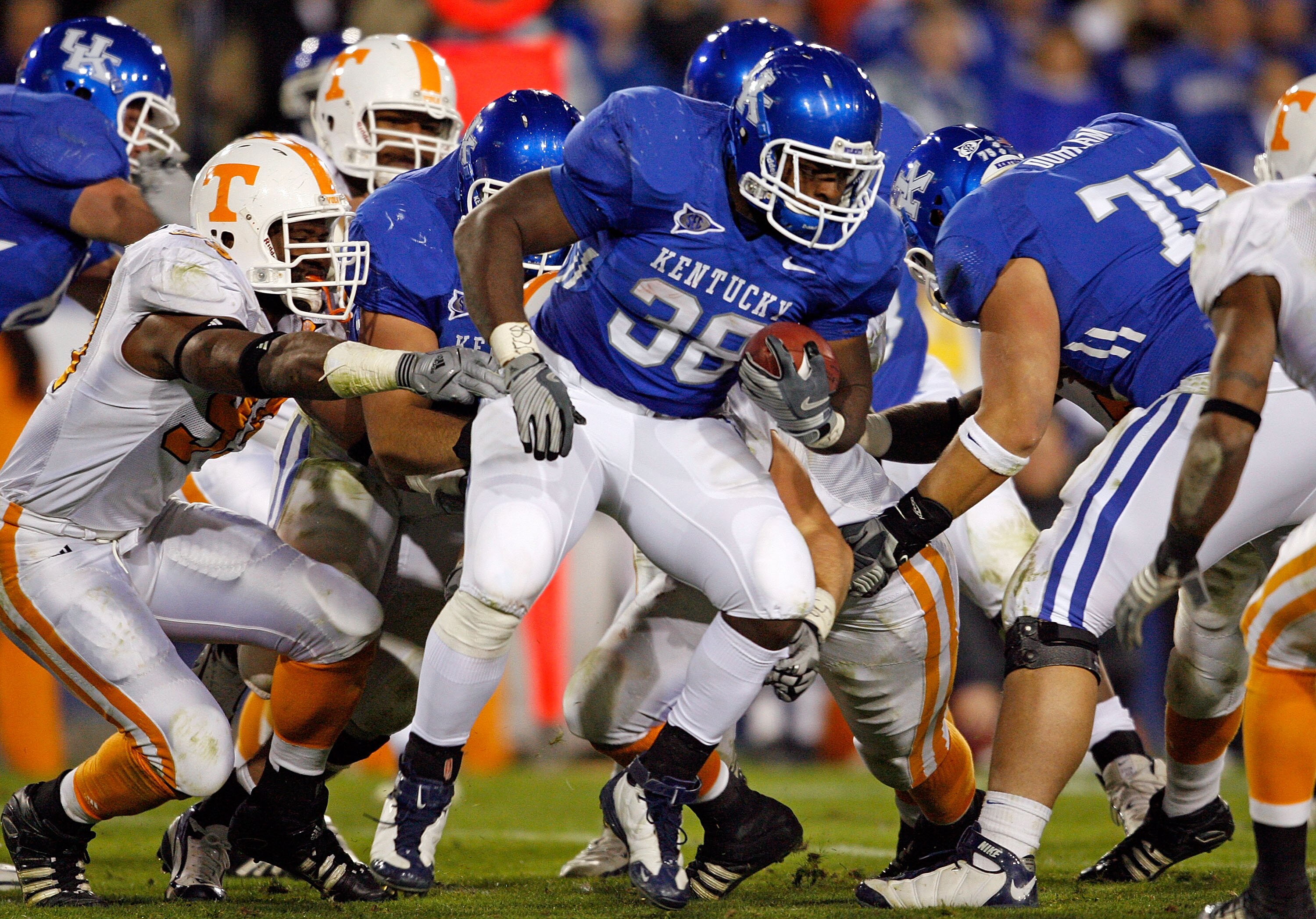 LEXINGTON, KY - NOVEMBER 28:  John Conner #38 of the Kentucky Wildcats runs with the ball against the Tennessee Volunteers during the SEC game at Commonwealth Stadium on November 28, 2009 in Lexington, Kentucky.  (Photo by Andy Lyons/Getty Images)