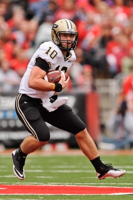 COLUMBUS, OH - OCTOBER 23:  Quarterback Sean Robinson #10 of the Purdue Boilermakers runs with the ball against the Ohio State Buckeyes at Ohio Stadium on October 23, 2010 in Columbus, Ohio.  (Photo by Jamie Sabau/Getty Images)