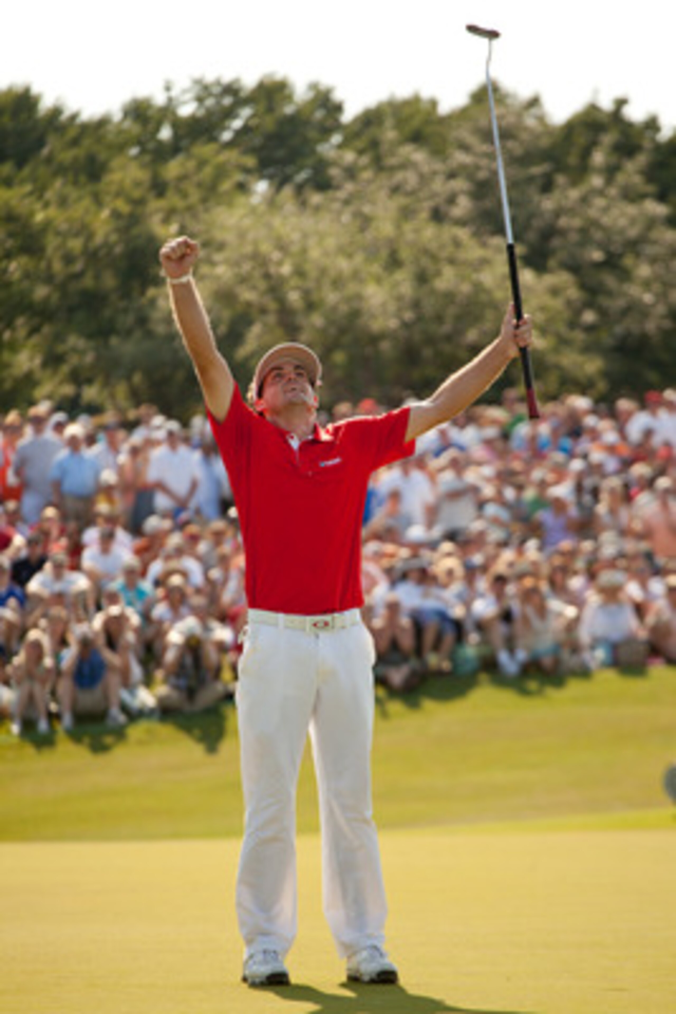 IRVING, TX - MAY 29: Keegan Bradley raises his arms to celebrate his victory at the HP Byron Nelson Championship at TPC Four Seasons at Las Colinas on May 29, 2011 in Irving, Texas. (Photo by Darren Carroll/Getty Images)