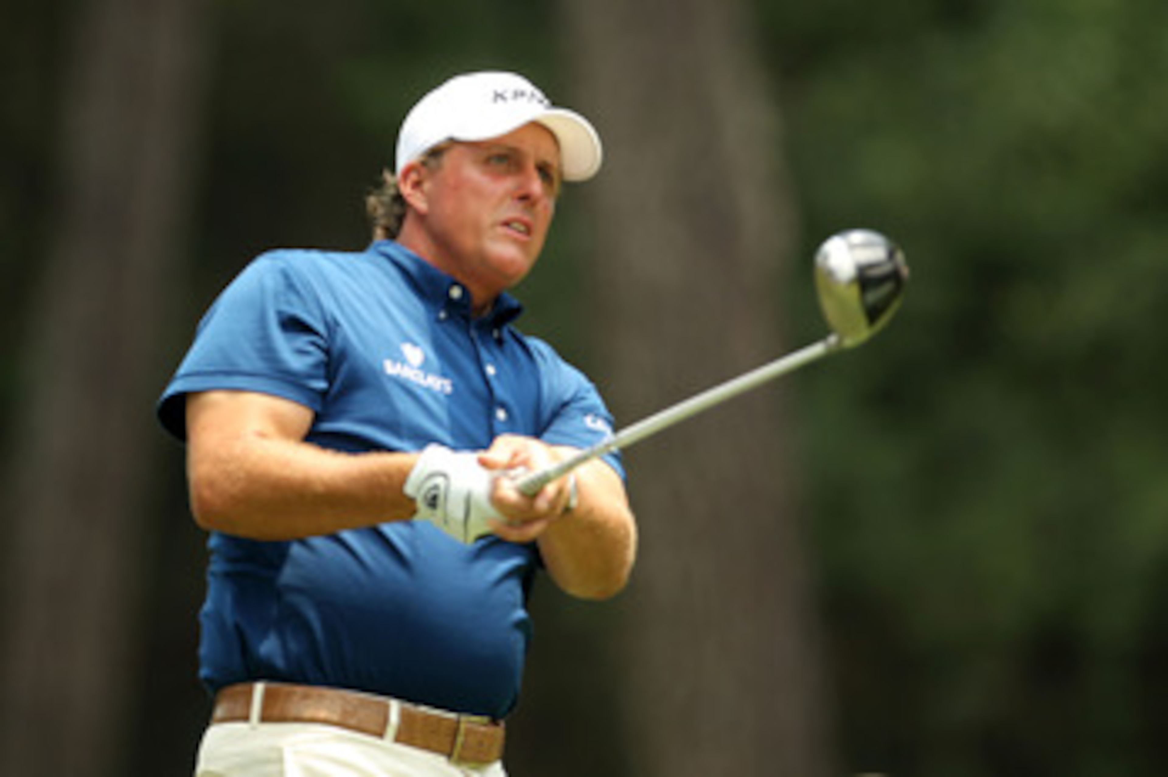 PONTE VEDRA BEACH, FL - MAY 14:  Phil Mickelson watches his tee shot on the sixth hole during the third round of THE PLAYERS Championship held at THE PLAYERS Stadium course at TPC Sawgrass on May 14, 2011 in Ponte Vedra Beach, Florida.  (Photo by Mike Ehr