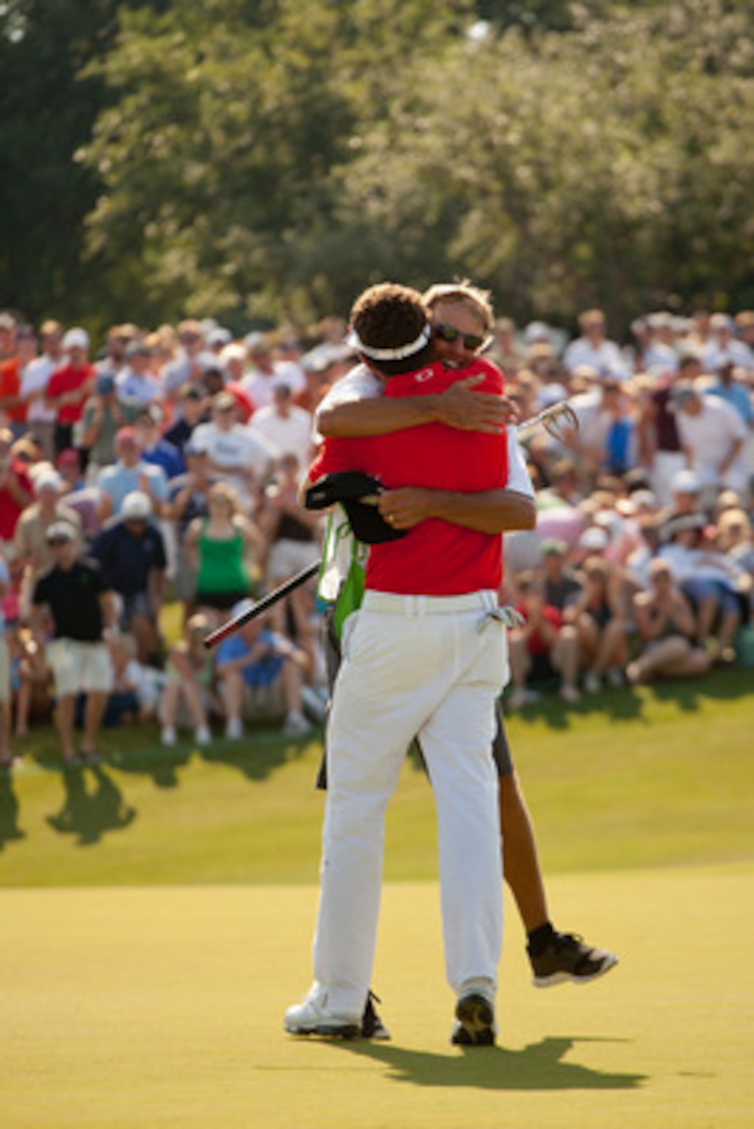 IRVING, TX - MAY 29: Keegan Bradley embraces caddie Steven Hale following his victiory at the HP Byron Nelson Championship at TPC Four Seasons at Las Colinas on May 29, 2011 in Irving, Texas. (Photo by Darren Carroll/Getty Images)