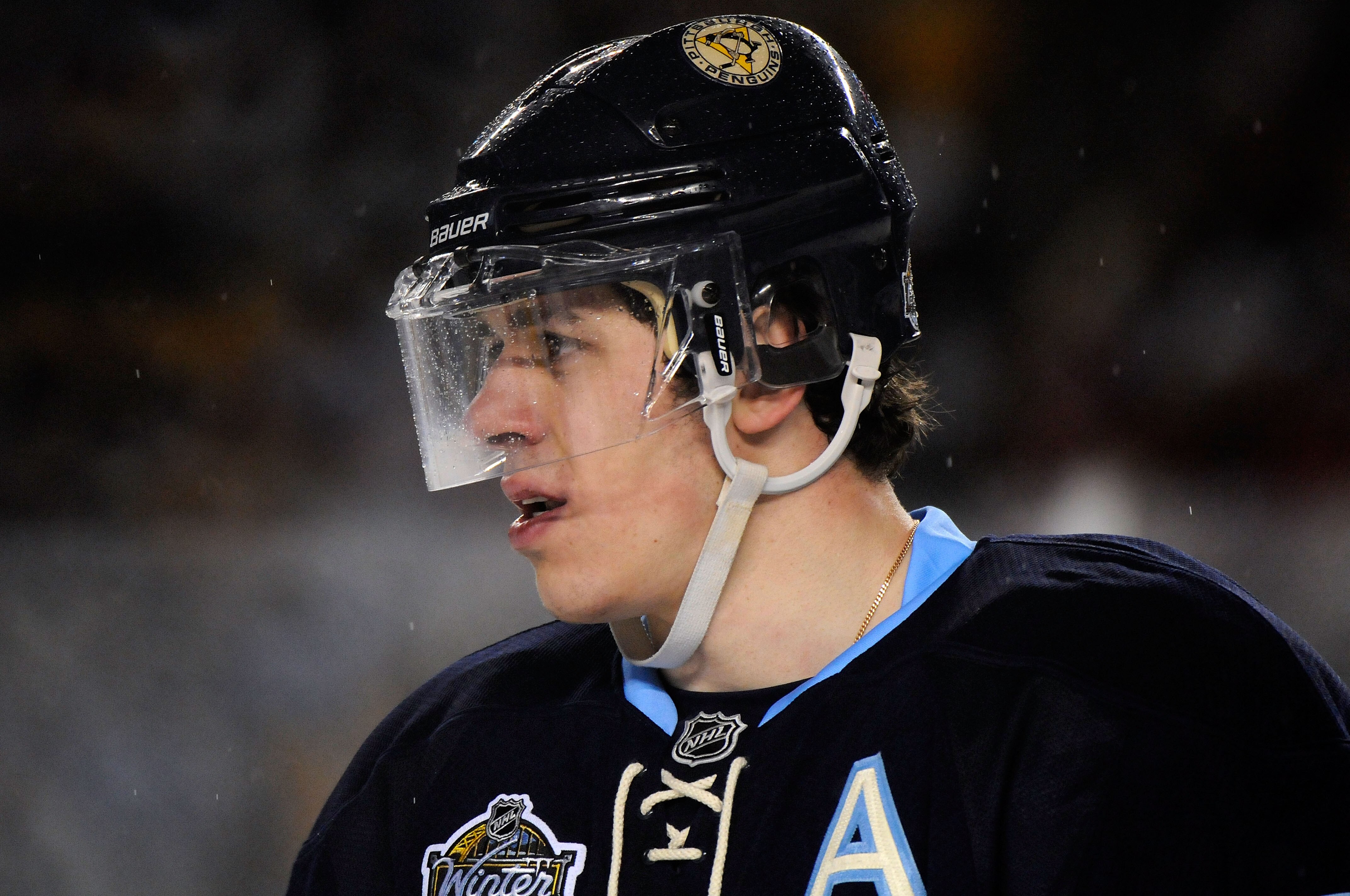 PITTSBURGH, PA - JANUARY 01:  Evgeni Malkin #71 of the Pittsburgh Penguins looks on during the third period of the game against the Washington Capitals at the 2011 NHL Bridgestone Winter Classic at Heinz Field on January 1, 2011 in Pittsburgh, Pennsylvani