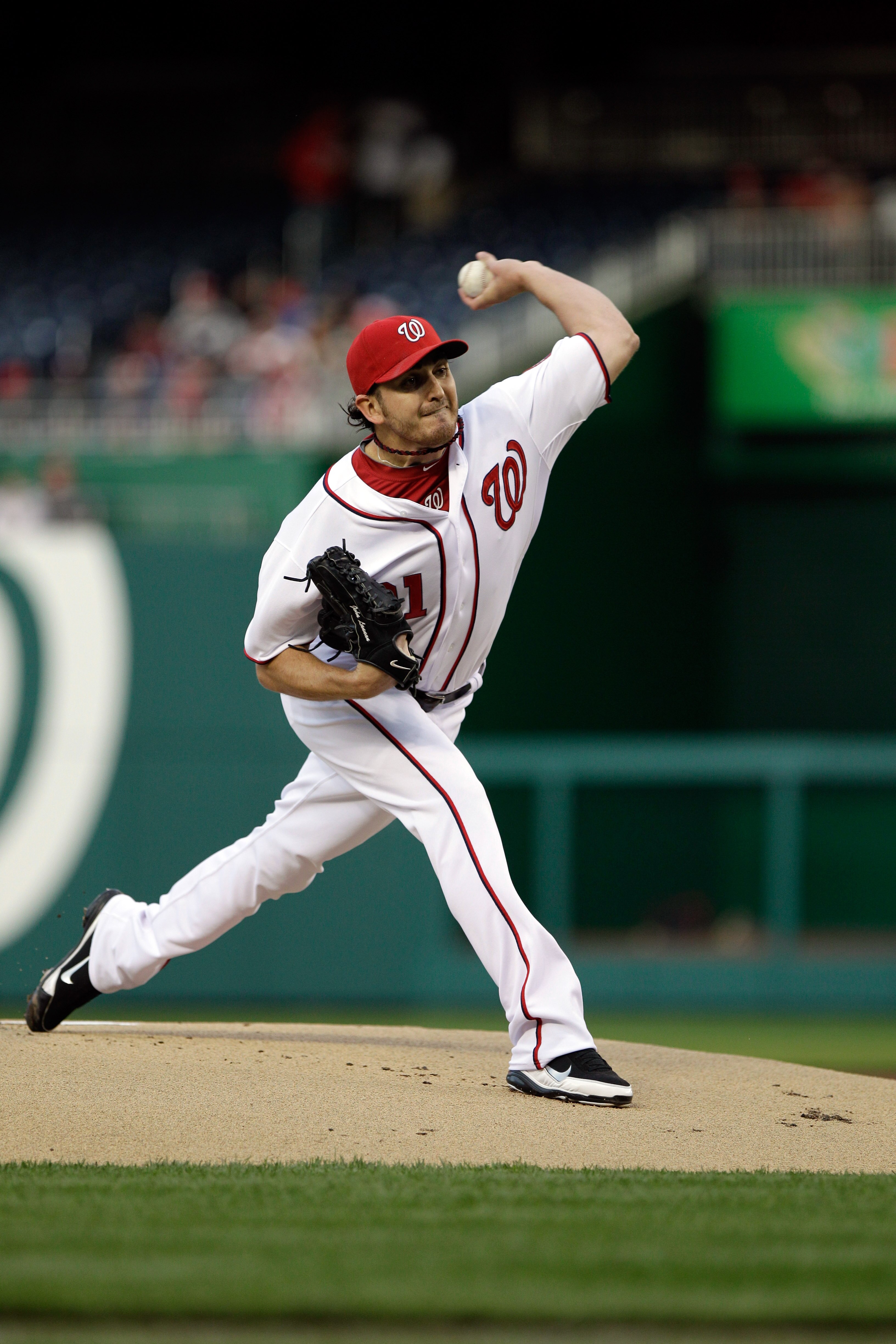 WASHINGTON, DC - APRIL 13:  Pitcher John Lannan #31 of the Washington Nationals delivers to a Philadelphia Phillies batter at Nationals Park on April 13, 2011 in Washington, DC.  (Photo by Rob Carr/Getty Images)