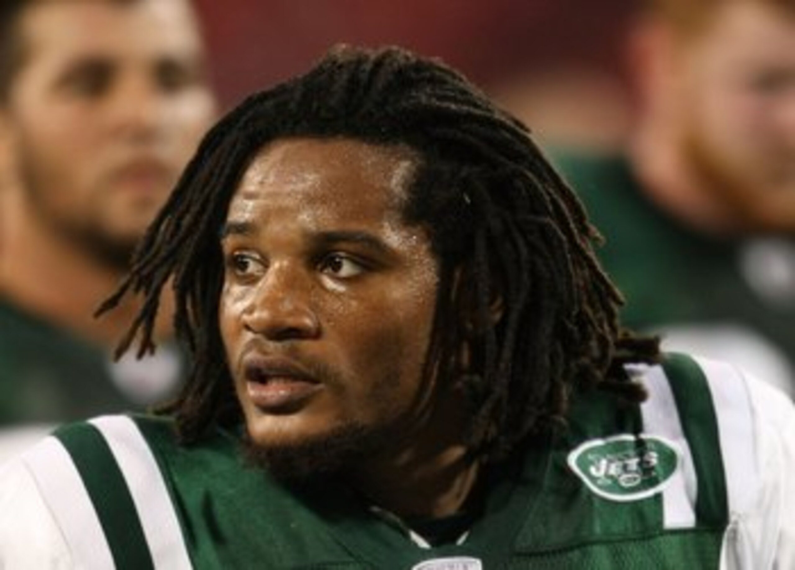 EAST RUTHERFORD, NJ - AUGUST 14: Emanuel Cook #38 of the New York Jets walks off the field against the St. Louis Rams during their preseason game at Giants Stadium on August 14, 2009  in East Rutherford, New Jersey.  (Photo by Nick Laham/Getty Images)