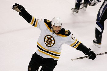 TAMPA, FL - MAY 25:  Milan Lucic #17 of the Boston Bruins celebrates his first period goal against the Tampa Bay Lightning in Game Six of the Eastern Conference Finals during the 2011 NHL Stanley Cup Playoffs at St Pete Times Forum on May 25, 2011 in Tamp