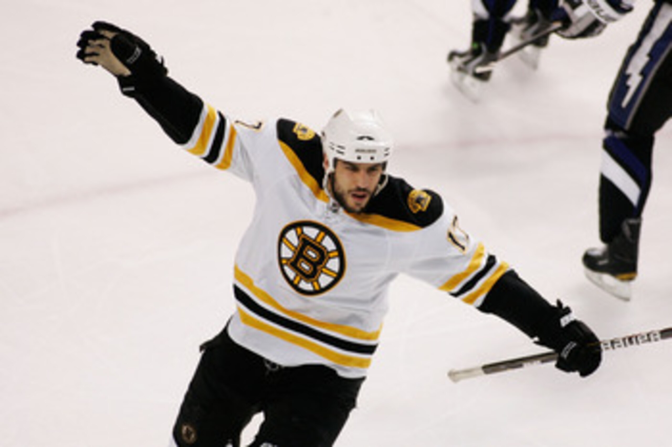 TAMPA, FL - MAY 25:  Milan Lucic #17 of the Boston Bruins celebrates his first period goal against the Tampa Bay Lightning in Game Six of the Eastern Conference Finals during the 2011 NHL Stanley Cup Playoffs at St Pete Times Forum on May 25, 2011 in Tamp