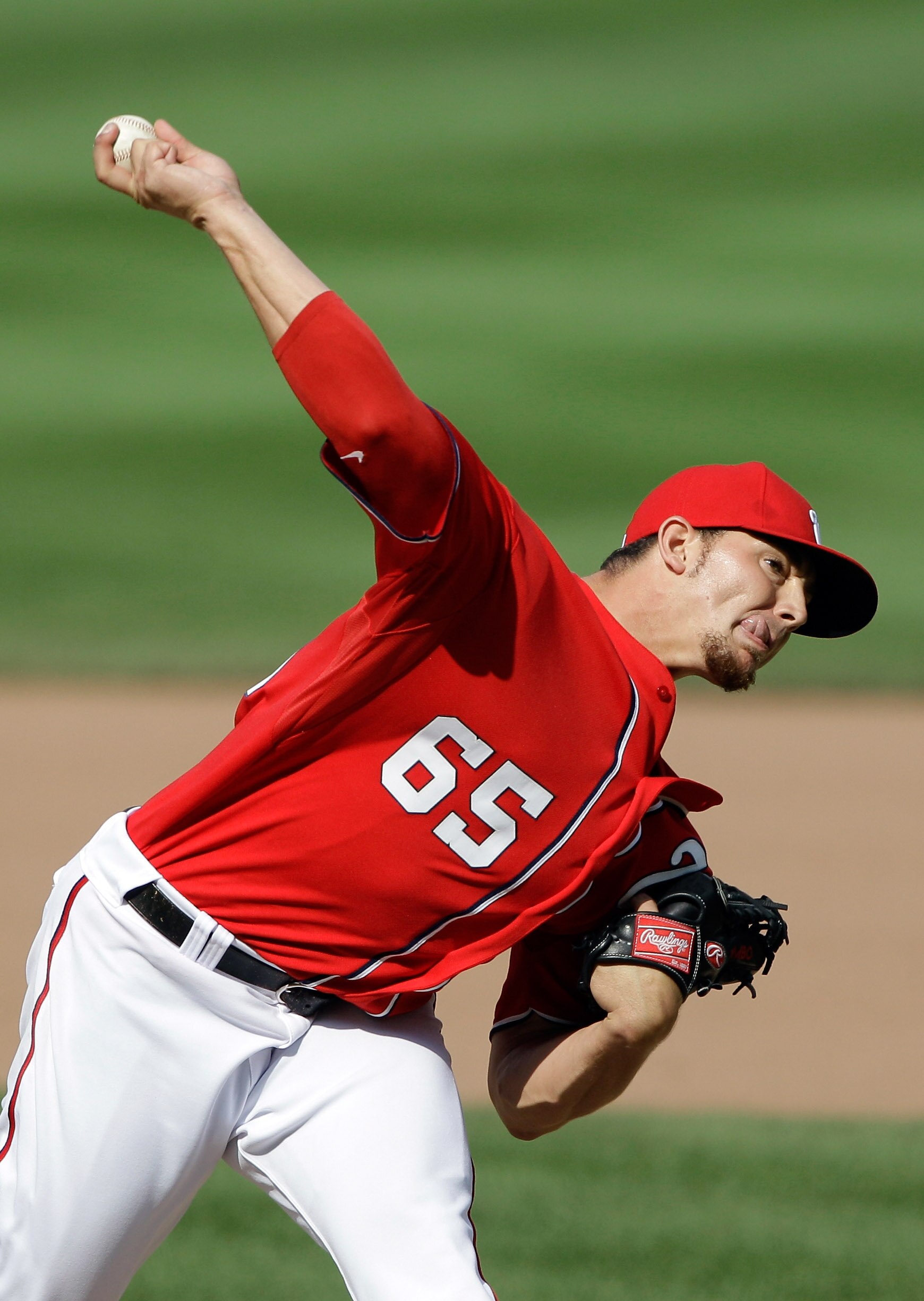 WASHINGTON, DC - MAY 15:  Pitcher Cole Kimball #65 of the Washington Nationals delivers to a Florida Marlins batter during the ninth inning at Nationals Park on May 15, 2011 in Washington, DC.  (Photo by Rob Carr/Getty Images)