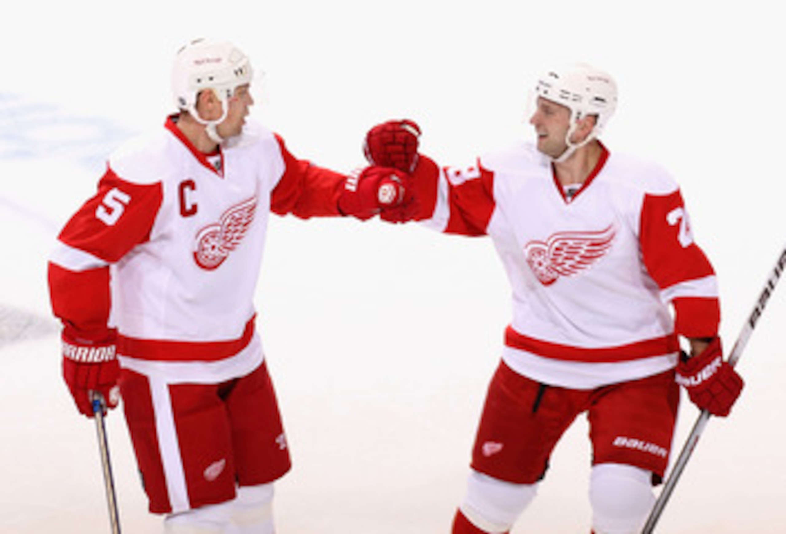 GLENDALE, AZ - APRIL 14:  Nicklas Lidstrom #5 and Brian Rafalski #28 of the Detroit Red Wings celebrate after Nicklas Lidstrom scored a first period power play goal against the Phoenix Coyotes in Game One of the Western Conference Quarterfinals during the