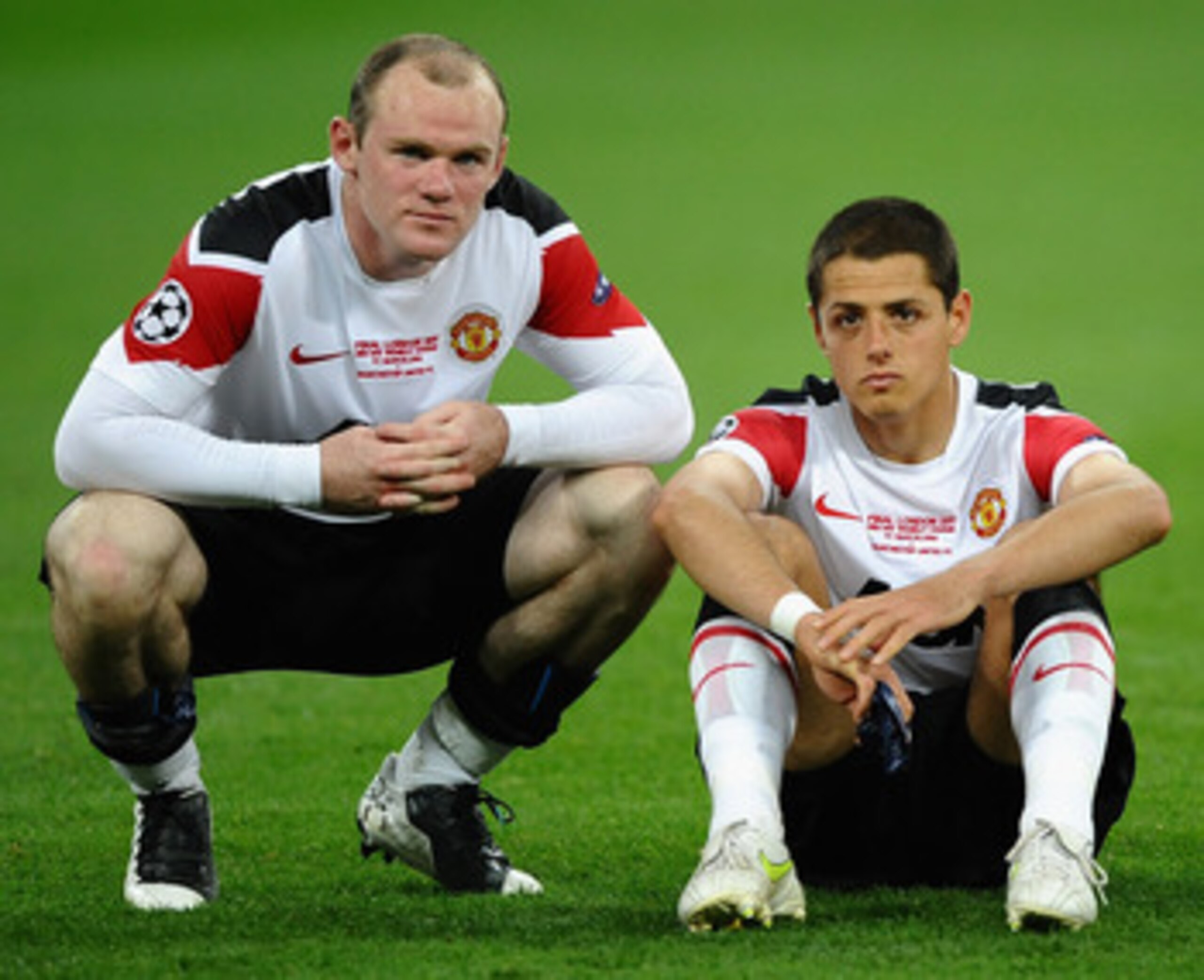 LONDON, ENGLAND - MAY 28: Wayne Rooney of Manchester United (L) and Javier Hernandez show their dissapointment after defeat in the UEFA Champions League final between FC Barcelona and Manchester United FC at Wembley Stadium on May 28, 2011 in London, Engl LONDON, ENGLAND - MAY 28: Wayne Rooney of Manchester United (L) and Javier Hernandez show their dissapointment after defeat in the UEFA Champions League final between FC Barcelona and Manchester United FC at Wembley Stadium on May 28, 2011 in London, Engl