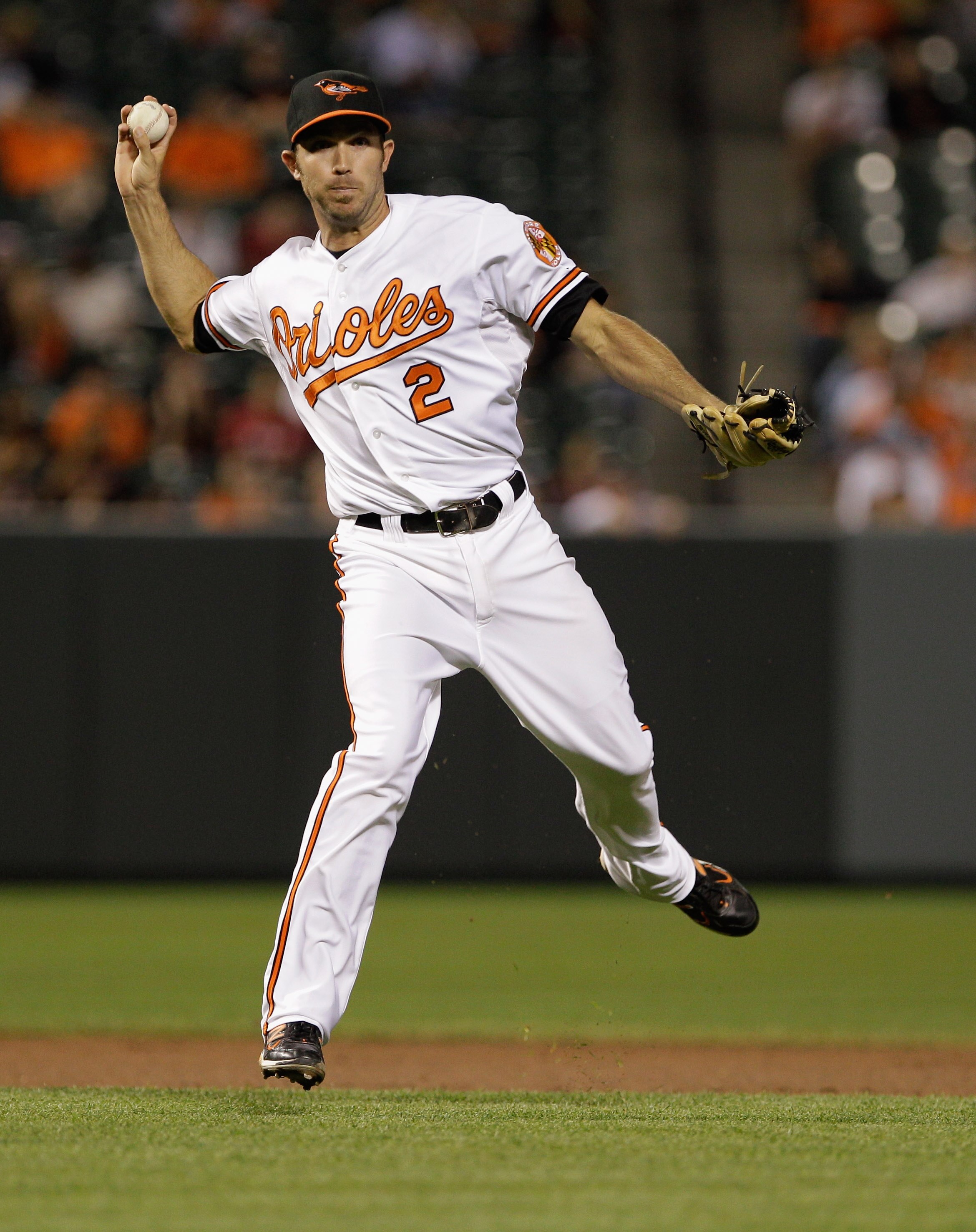 BALTIMORE, MD - MAY 12: J.J. Hardy #2 of the Baltimore Orioles in action against the Seattle Mariners at Oriole Park at Camden Yards on May 12, 2011 in Baltimore, Maryland.  (Photo by Rob Carr/Getty Images)